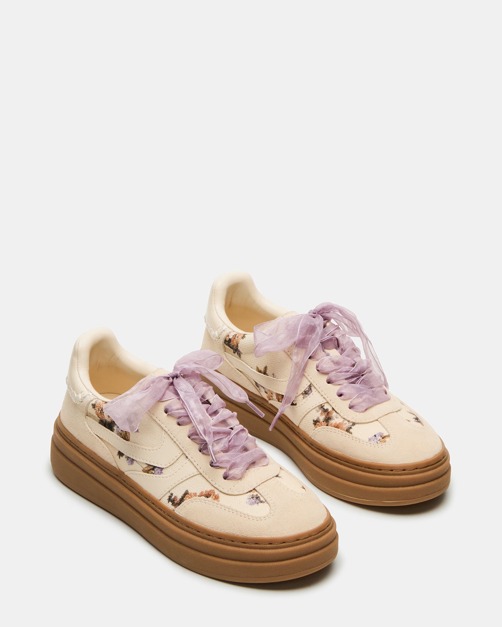 Close-up of the unique print on DODGE low top sneakers.