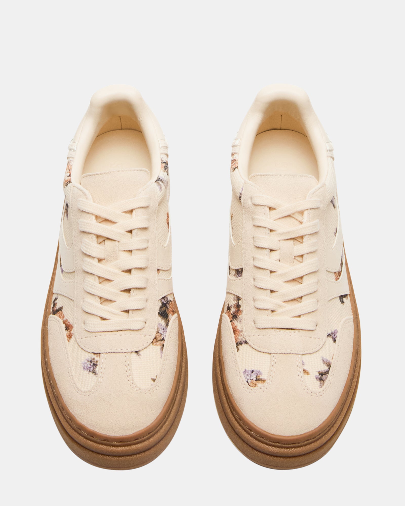DODGE Floral Multi sneakers displayed against a casual outdoor backdrop.