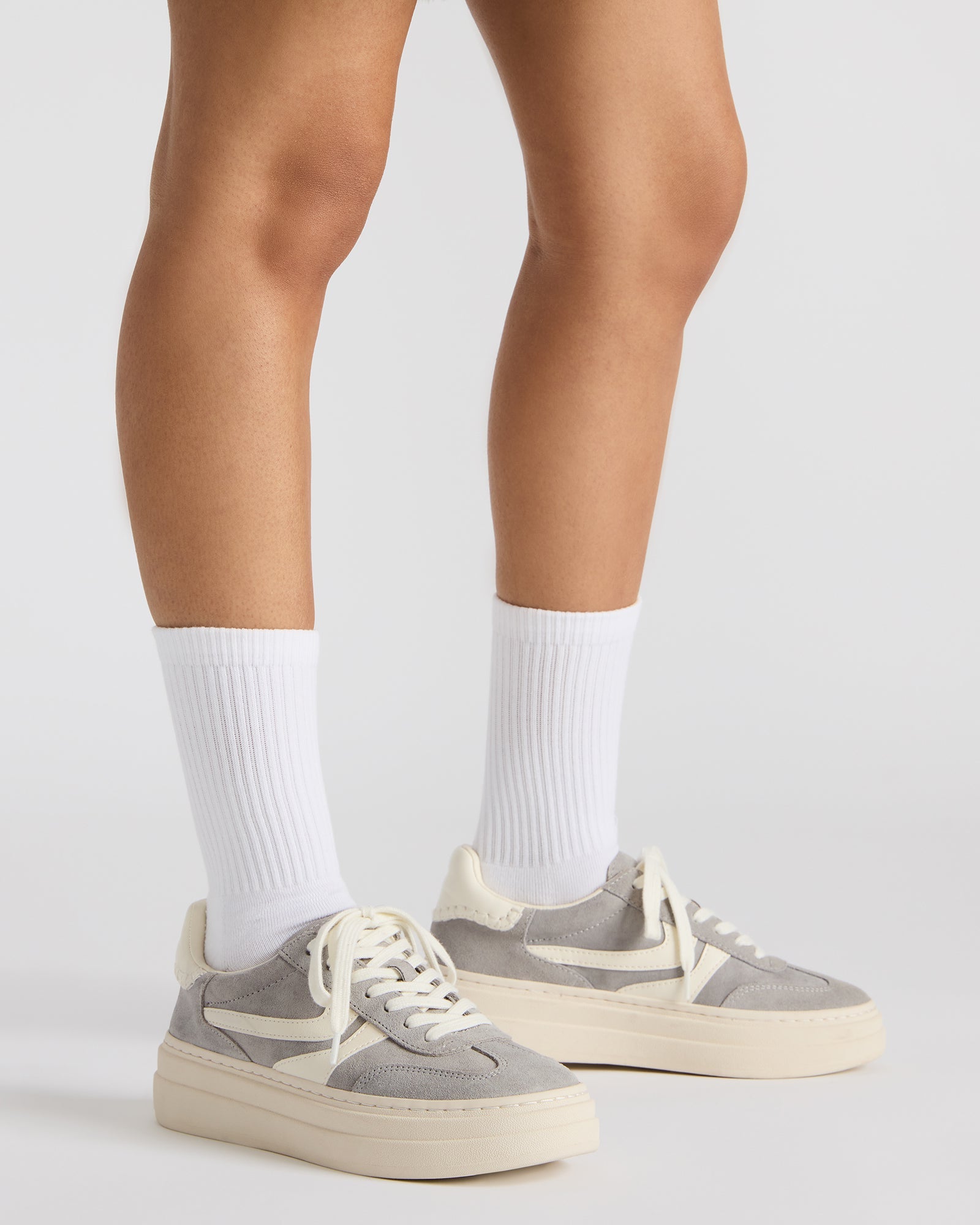Close-up of the sneakers textured suede and microsuede upper