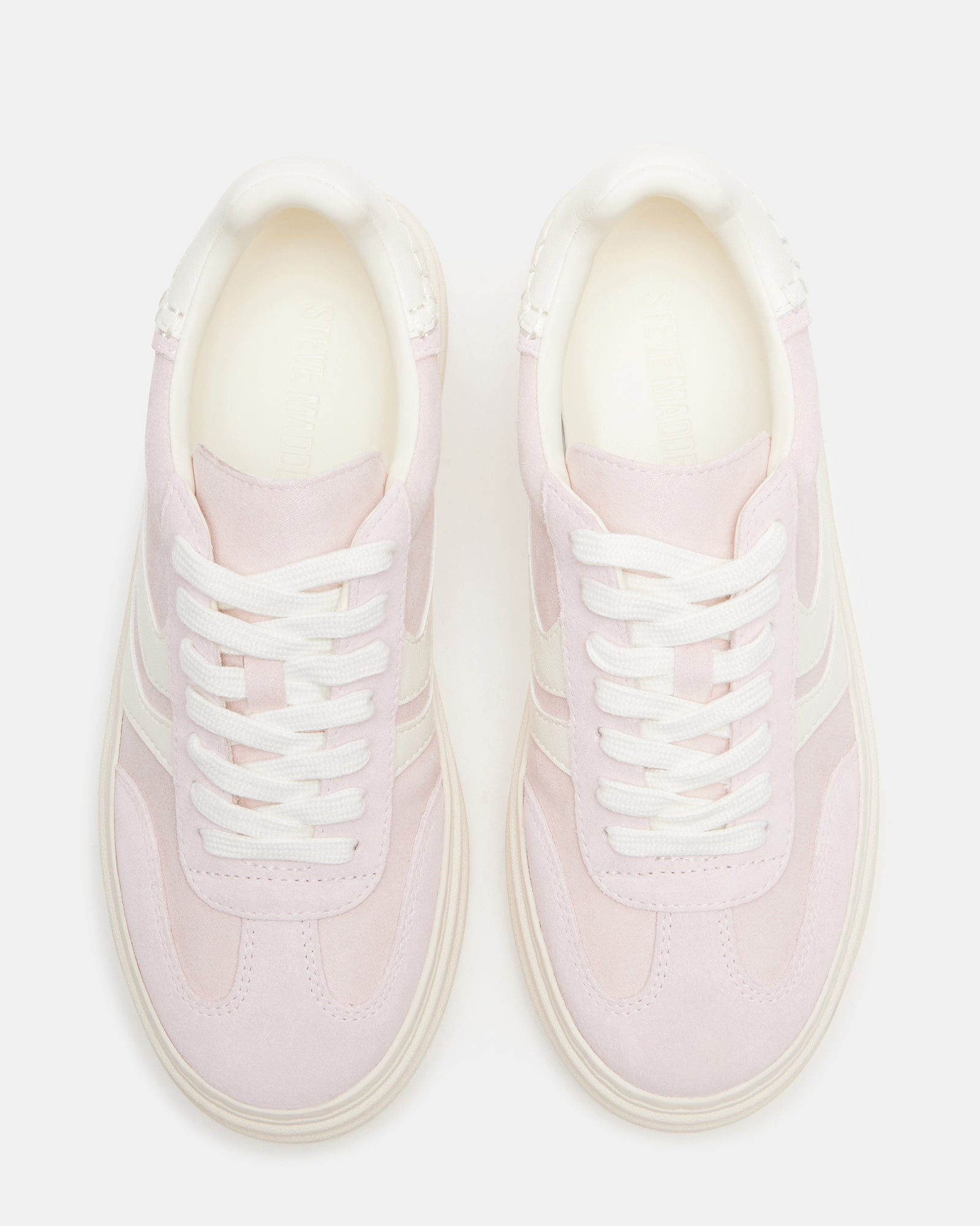 Top-down image highlighting comfort insole of womens fashion sneakers