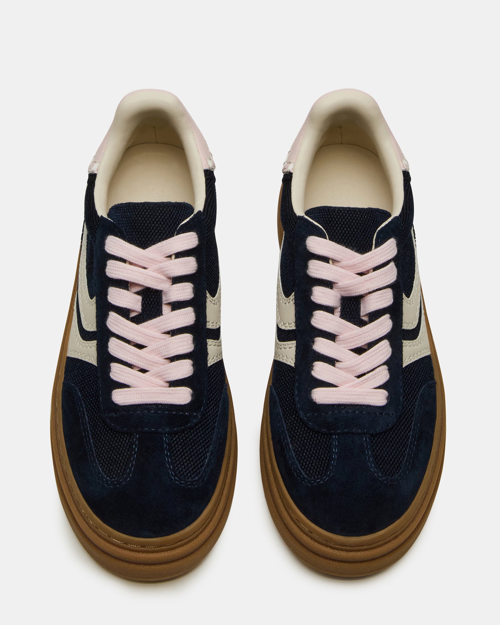 Dodge Navy Bottega Sneakers from the side, highlighting the sleek design.