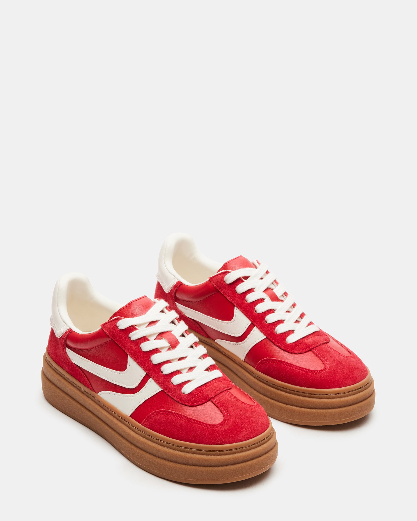 Dodge sneakers paired with chinos for a business casual ensemble