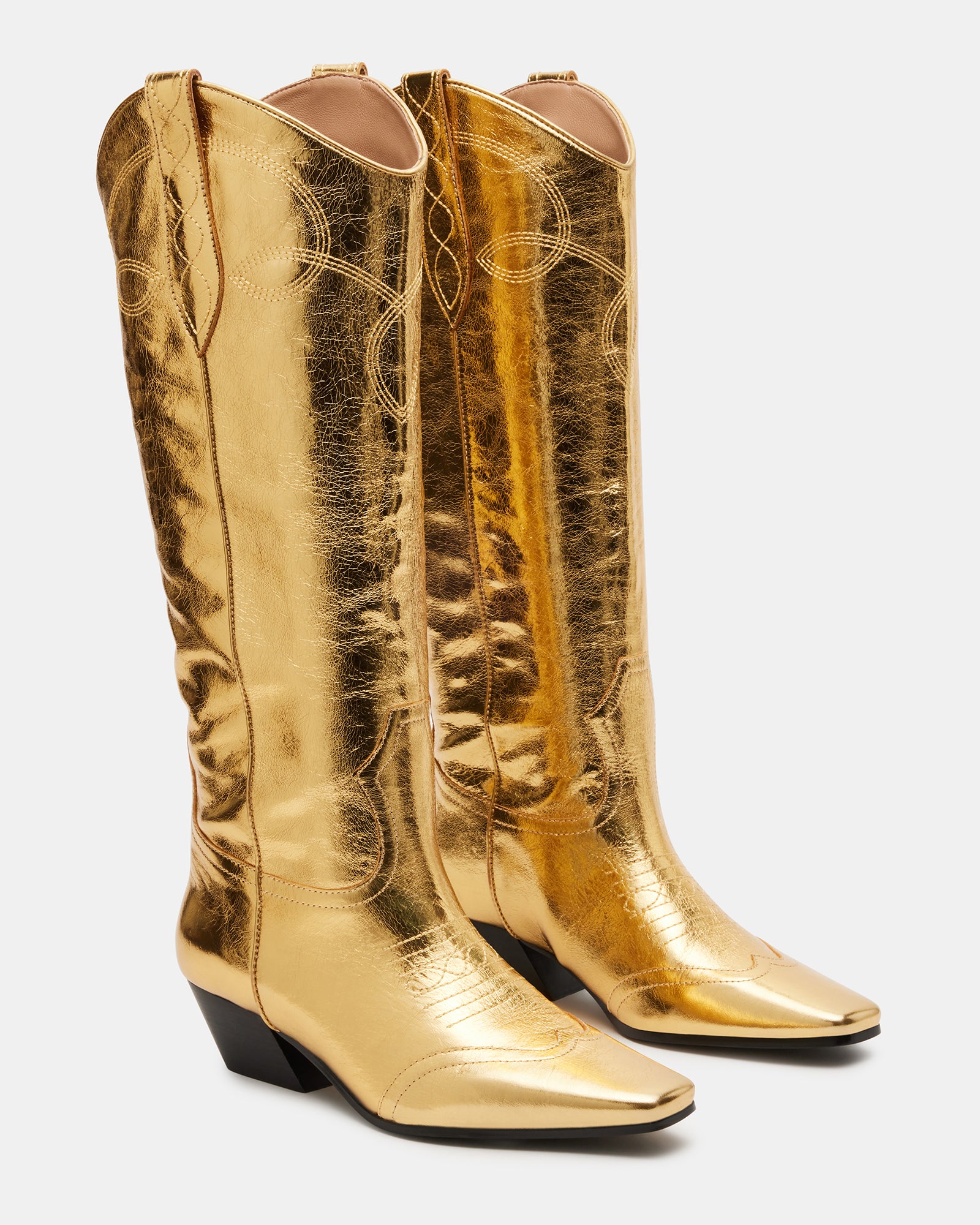 Close-up of the leather texture and stitching on the Dollie cowboy boots.