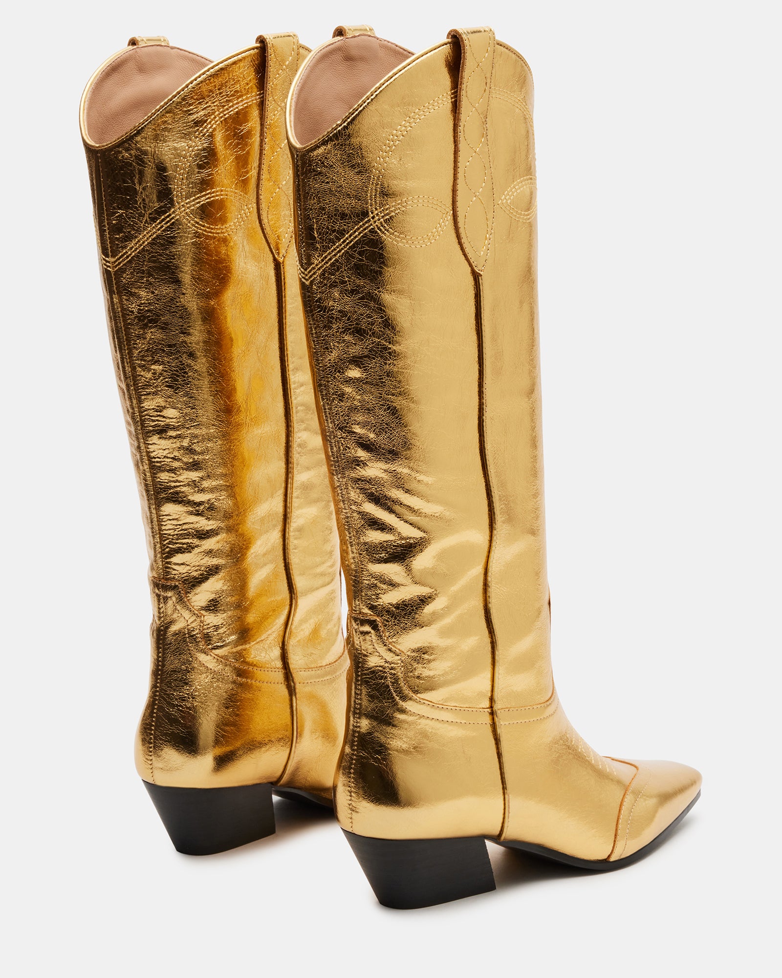Close-up of the leather texture and stitching on the Dollie cowboy boots.
