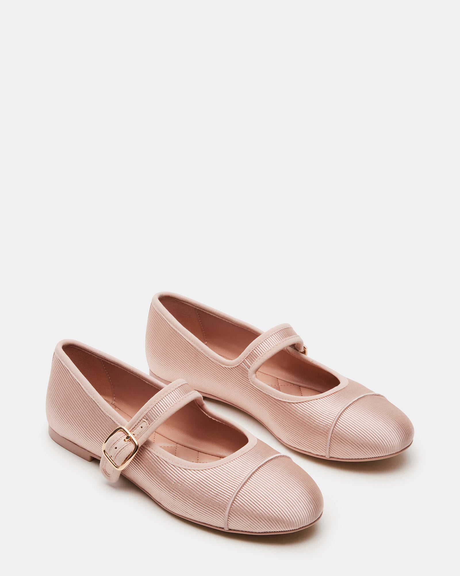 Top-down angle showing rounded toe design of Mary Jane flats in red satin.