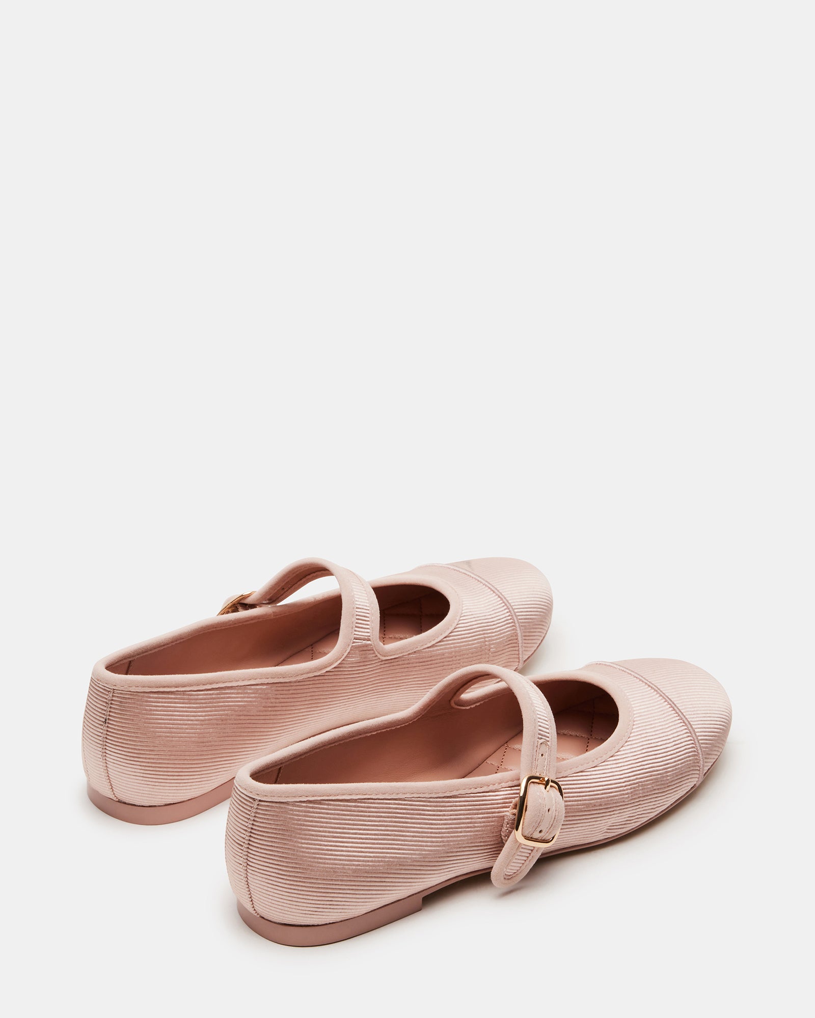 Top-down angle showing rounded toe design of Mary Jane flats in red satin.