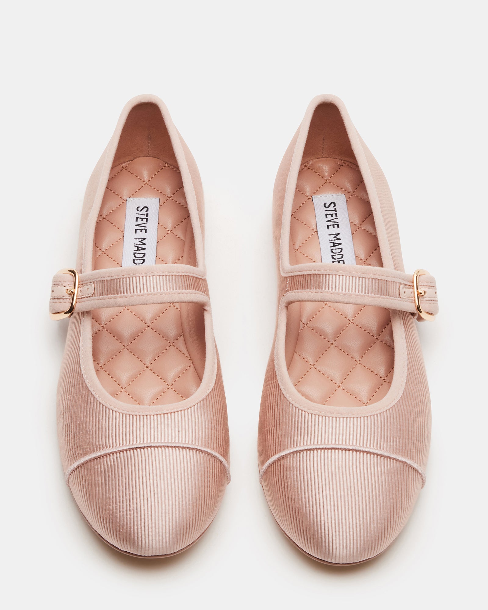 Side view of blush satin ballet flats with buckle strap, perfect for everyday wear.