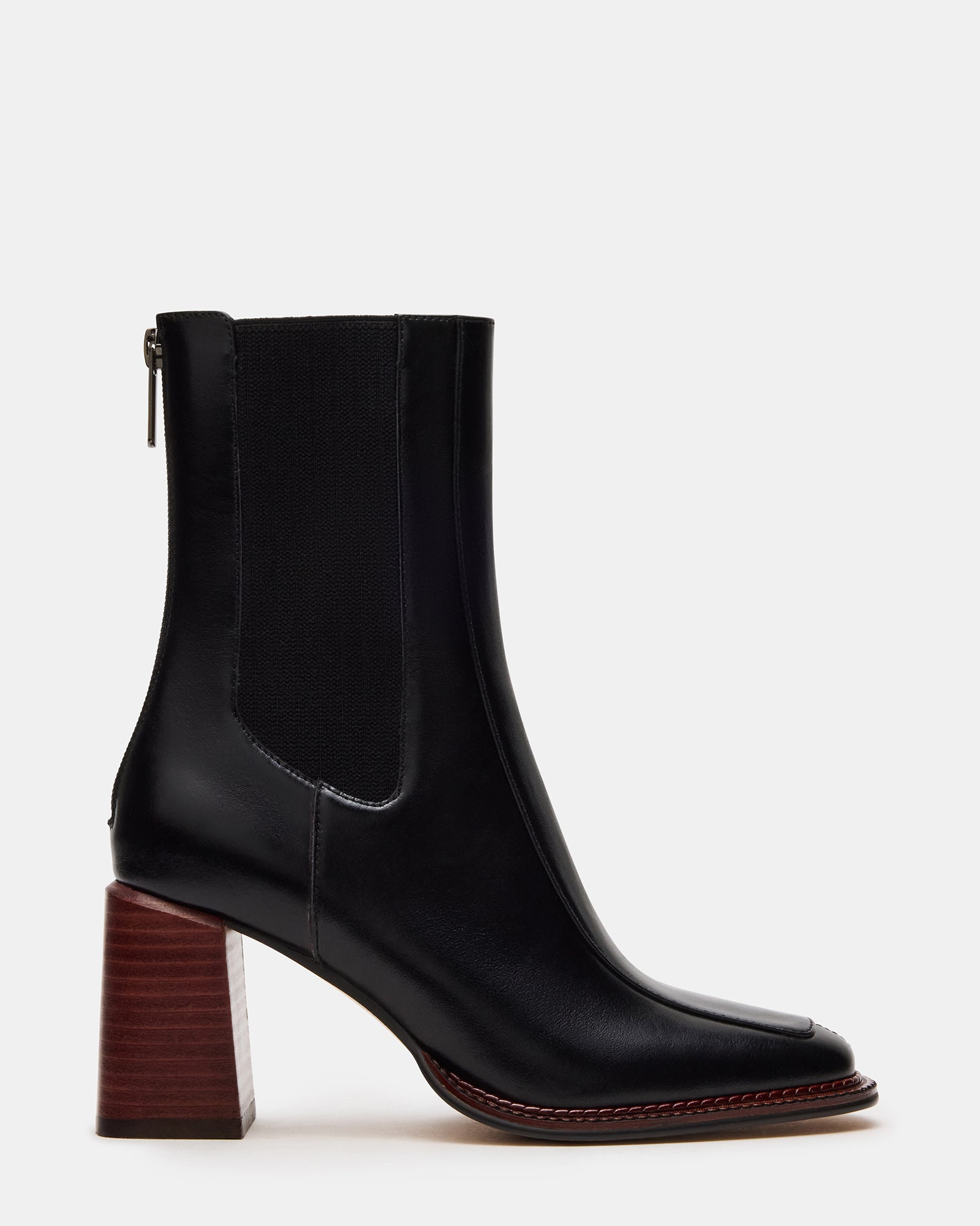 Side view of black leather Chelsea boots with stacked heel, perfect for everyday fashion