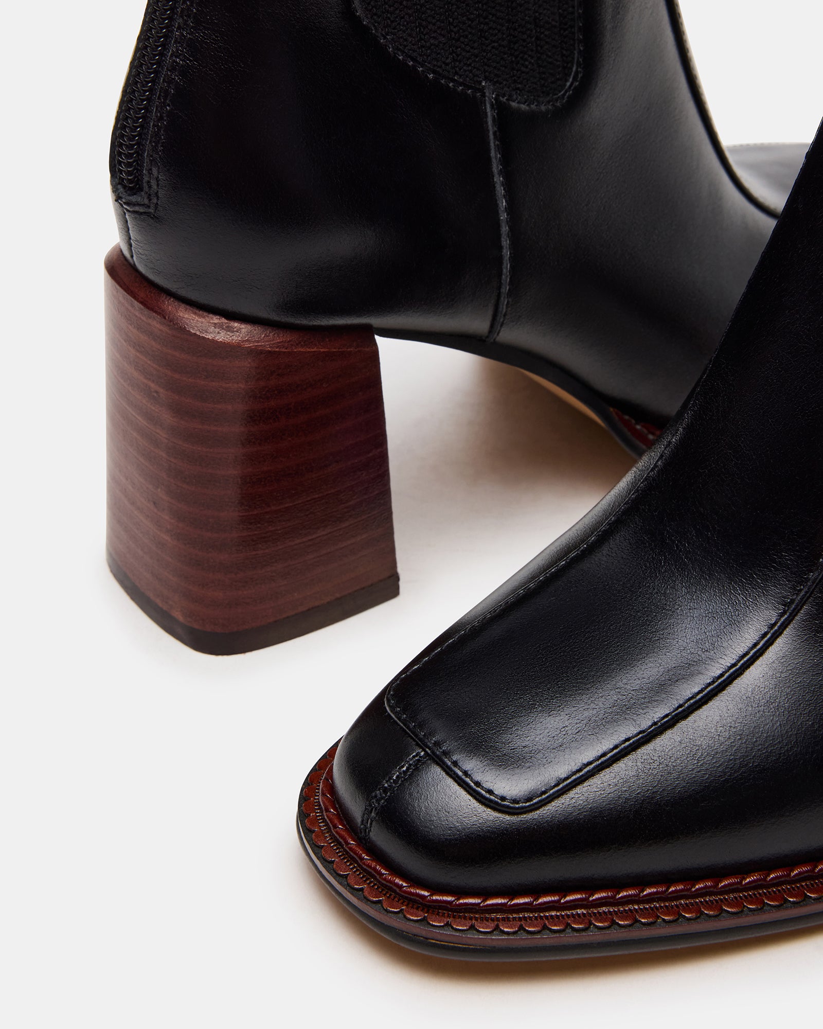 Fashionable black Chelsea shoes boots styled with casual outfit for women and men