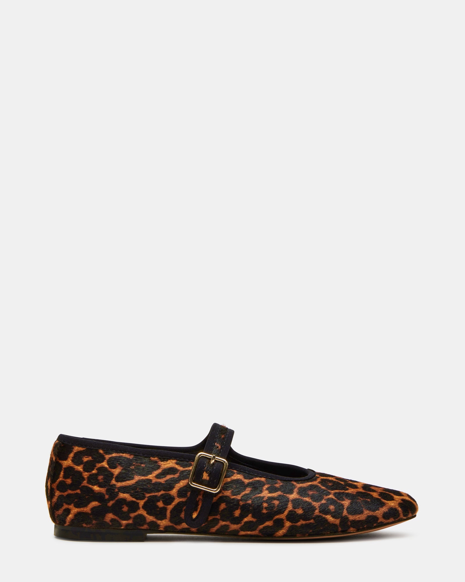 Dreaming Leopard ballet flats shown in profile view on wooden floor
