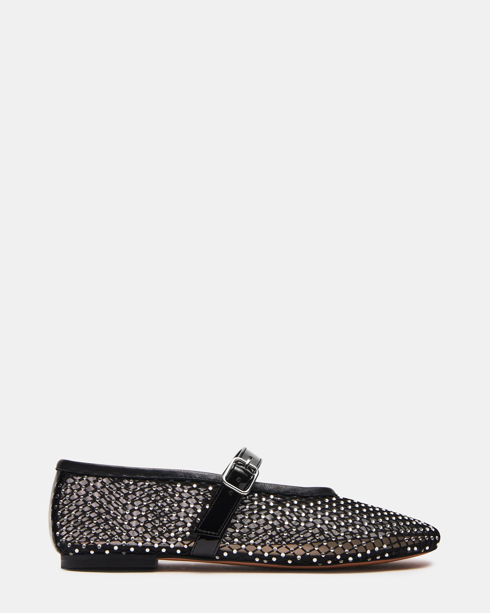 Close-up side view of black ballet flats showing mesh texture and slim silhouette