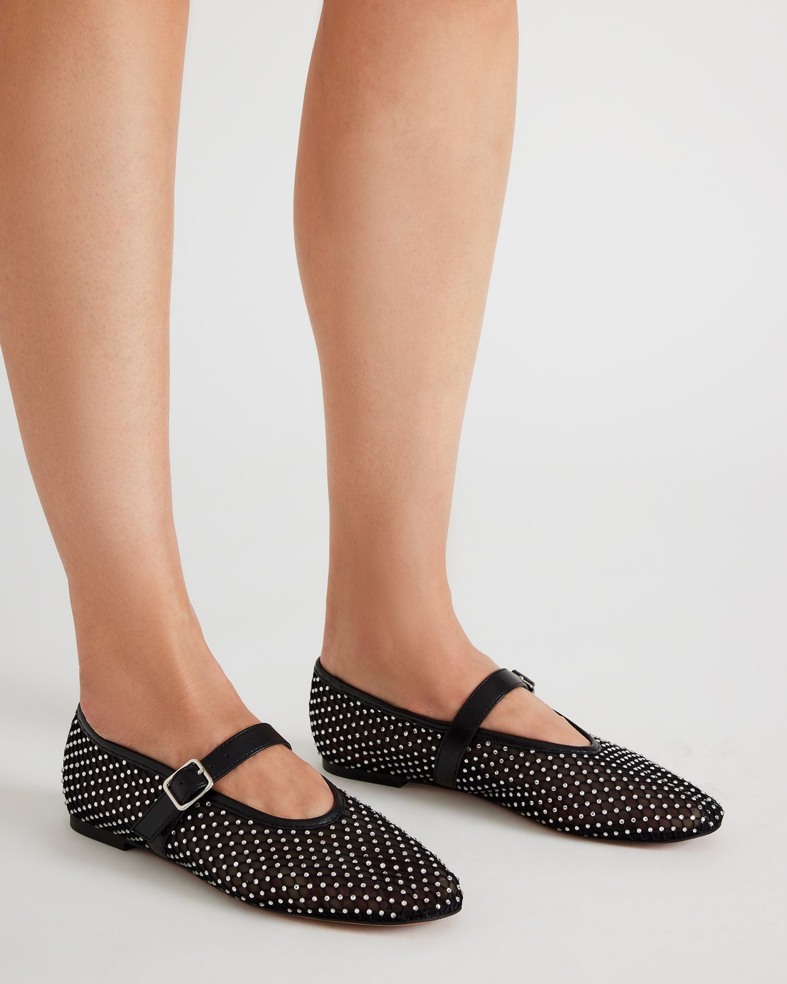 Top view of ballet ballerina flats displaying Mary Jane strap and soft inner lining