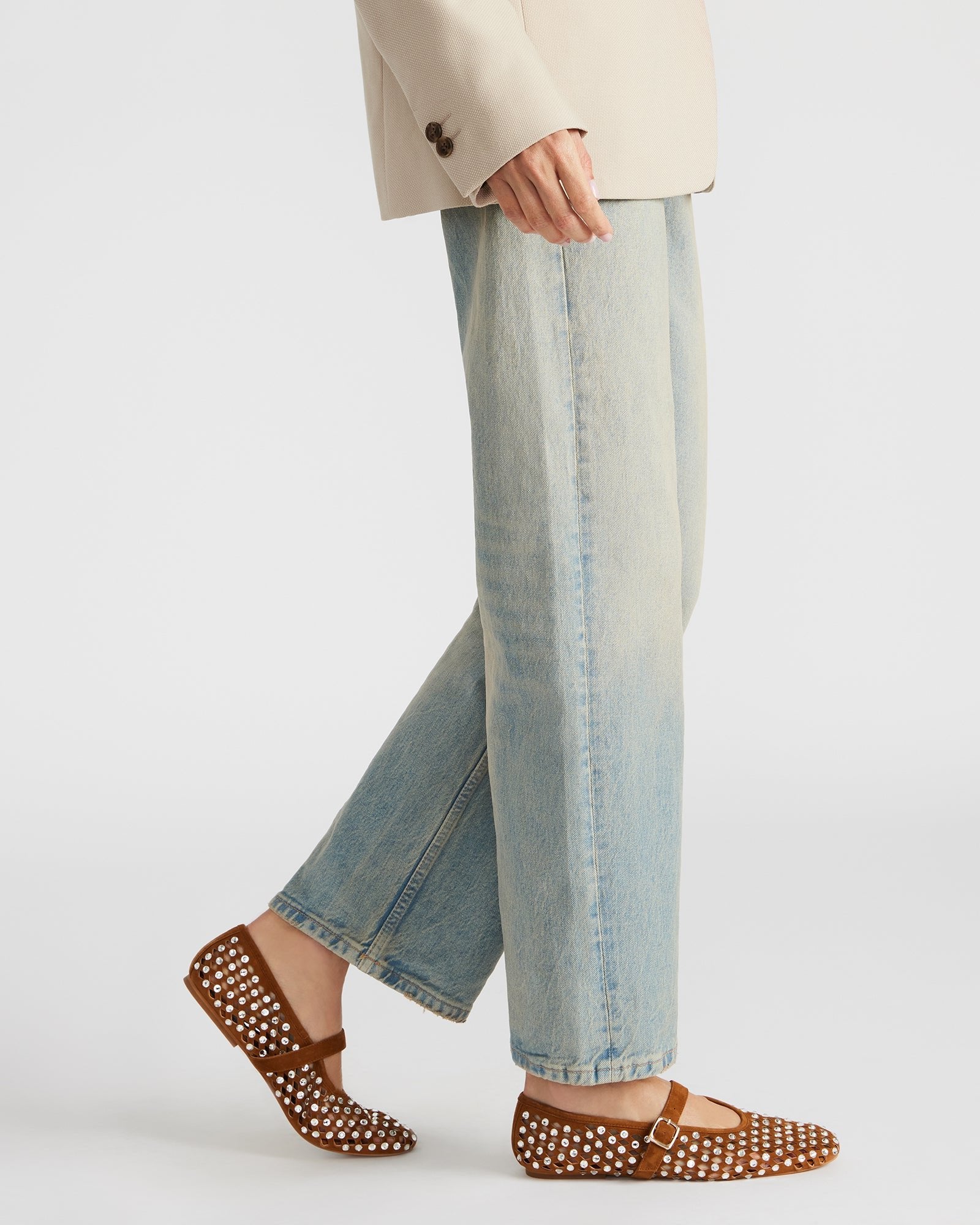 Side view of ballet flats paired with tailored trousers for workwear inspiration