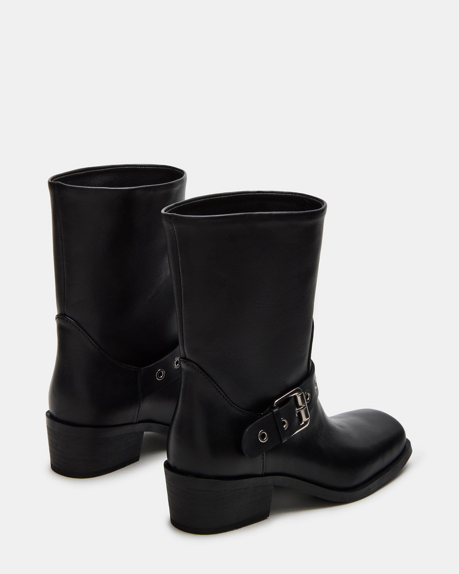 Dusk moto boots styled for winter city streets in NYC