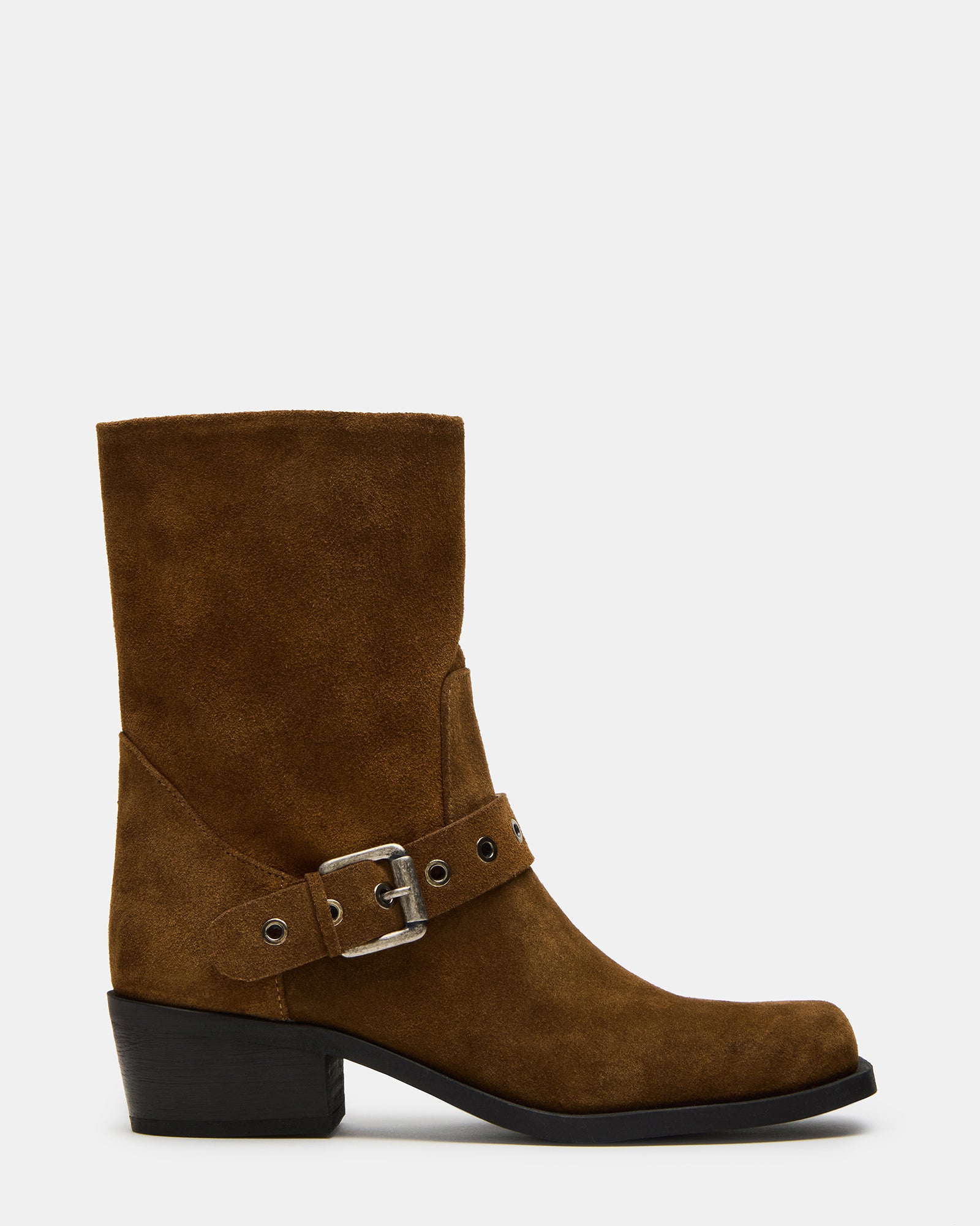 Tan suede moto boots for women styled with jeans