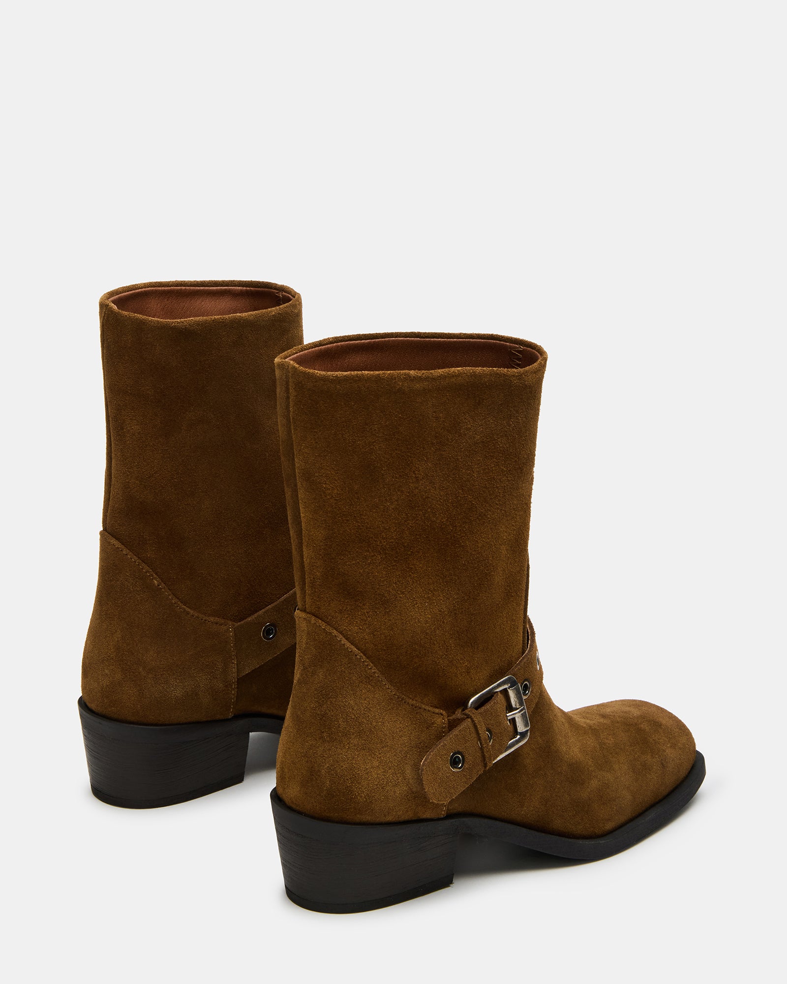 Close-up of square toe and buckle detail on boots