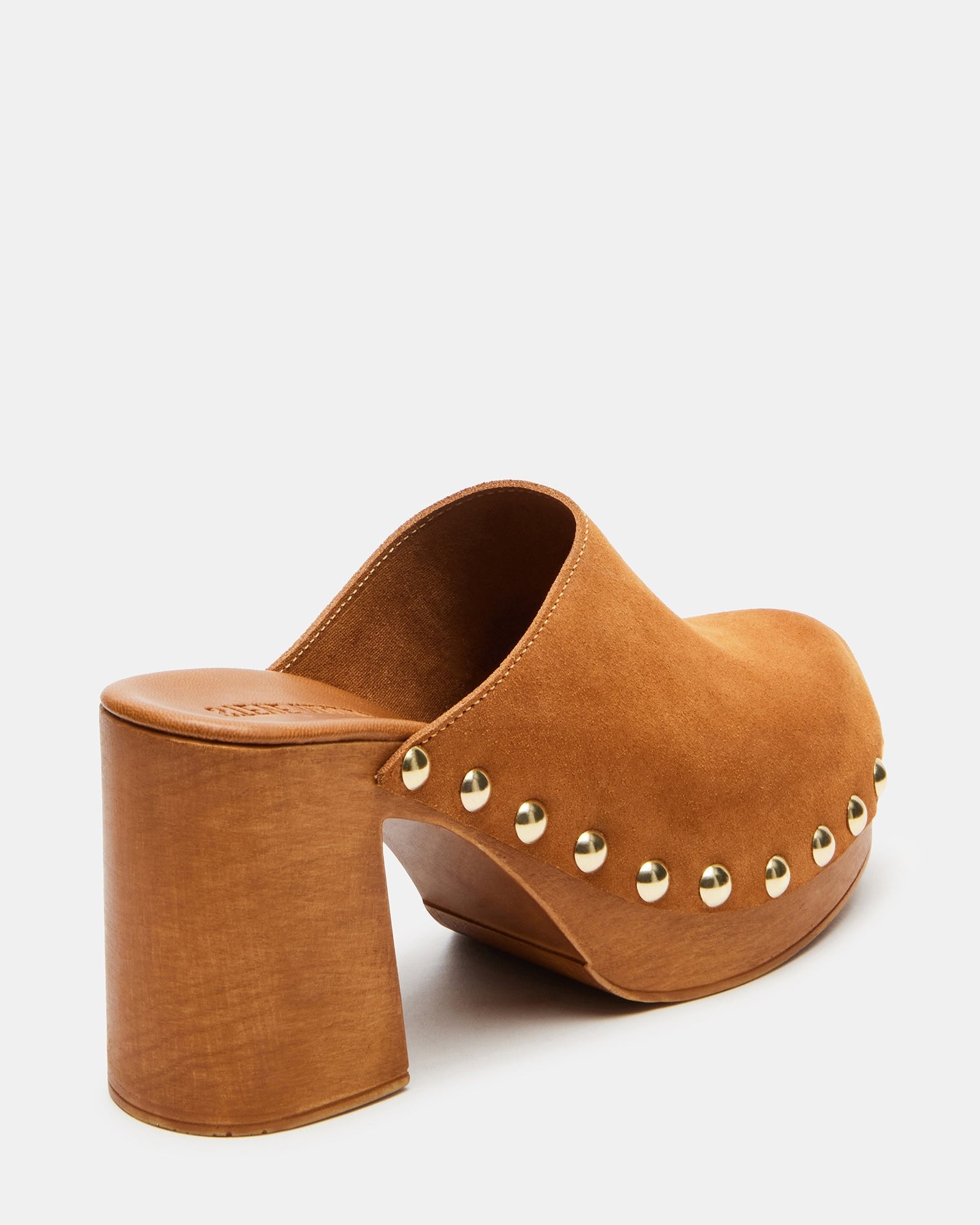 Top view of stylish suede mules with studded design and rounded toe