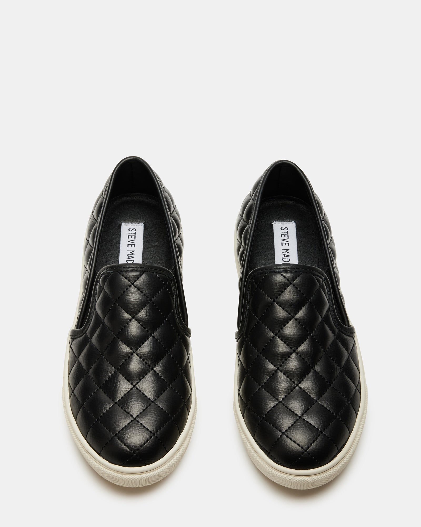 ECENTRCQ black platform sneakers angled on a neutral backdrop, highlighting quilted detail.