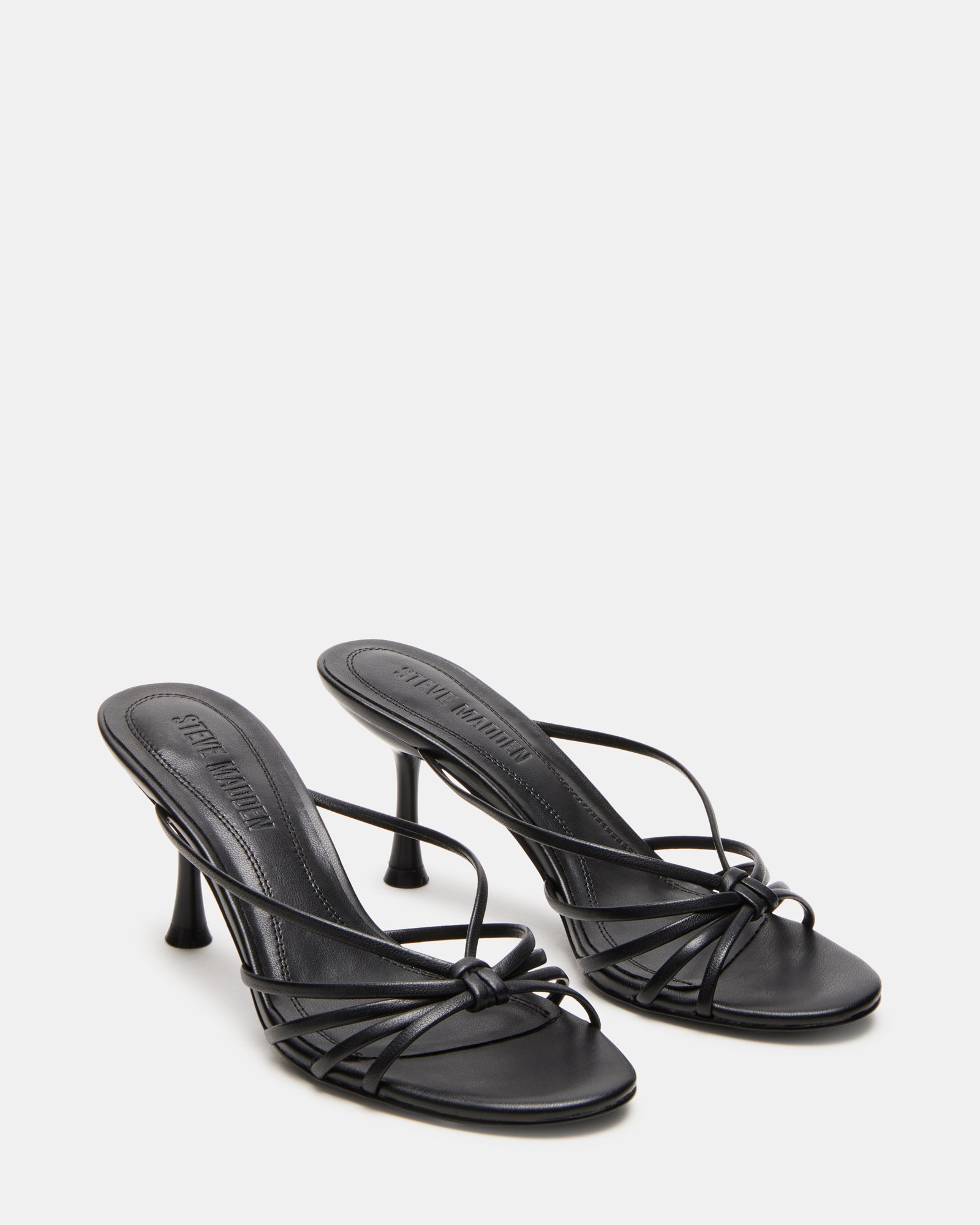 Outfit pairing: black strappy sandals with a summer dress
