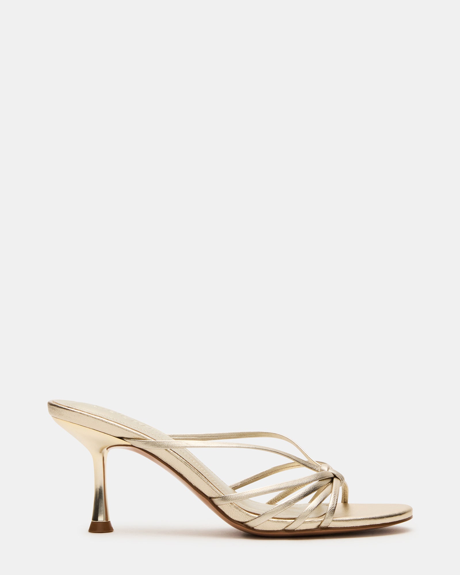 Side view of the Edna Champagne Leather Strappy Mule Heels showcasing the sleek heel and strap design