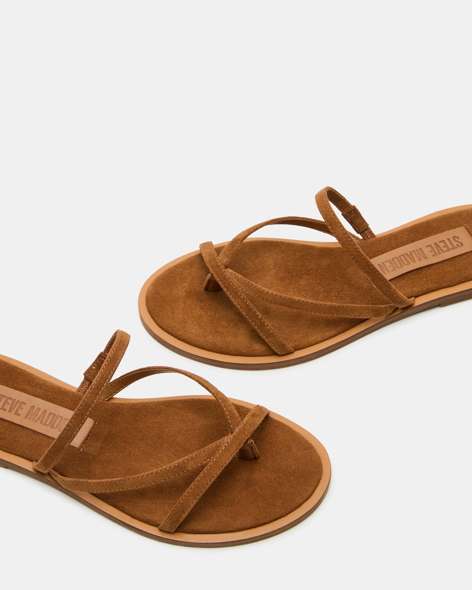 Close-up of the suede upper and synthetic sole detail