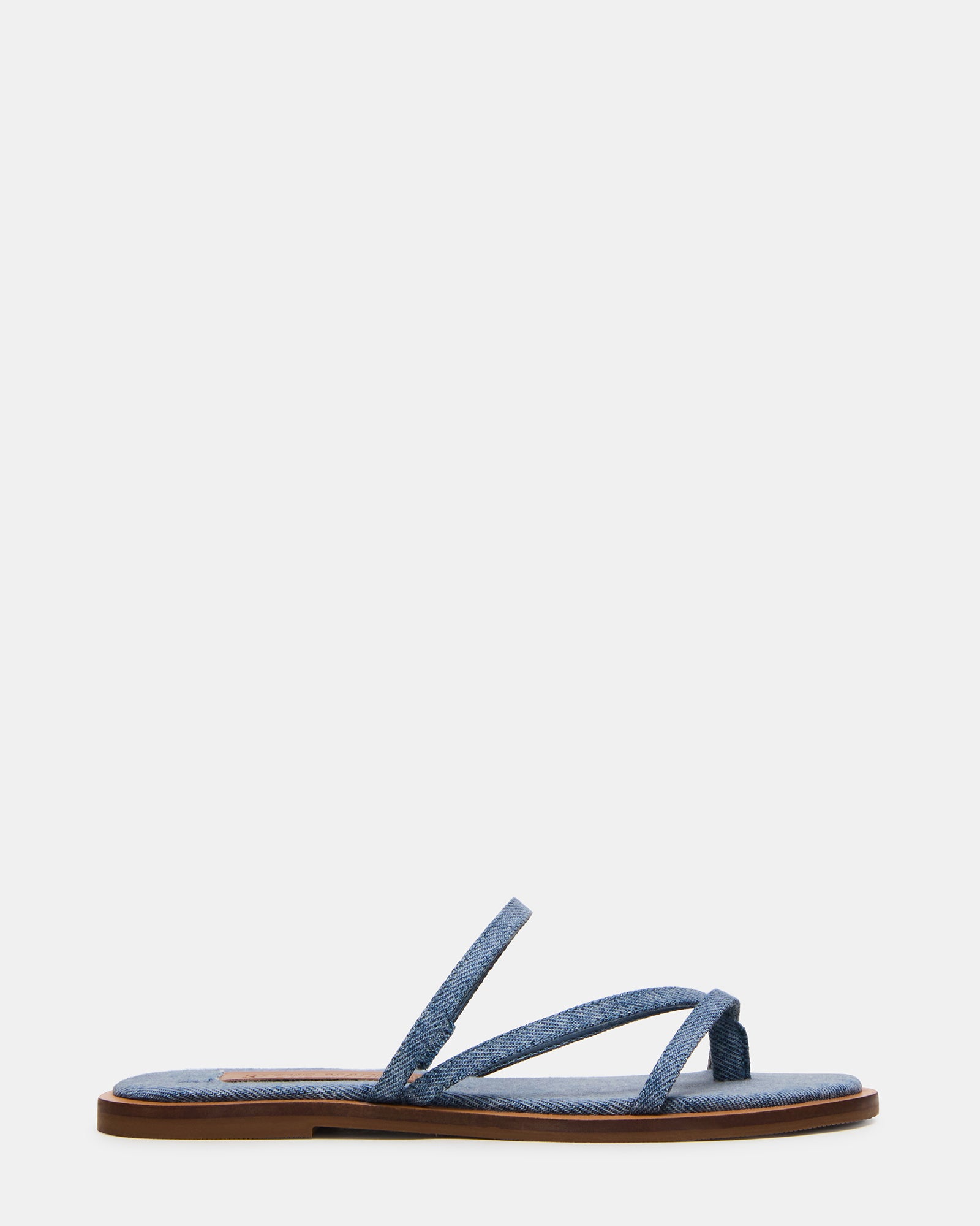 Close-up of ELLERY sandals showing textured fabric and adjustable strap
