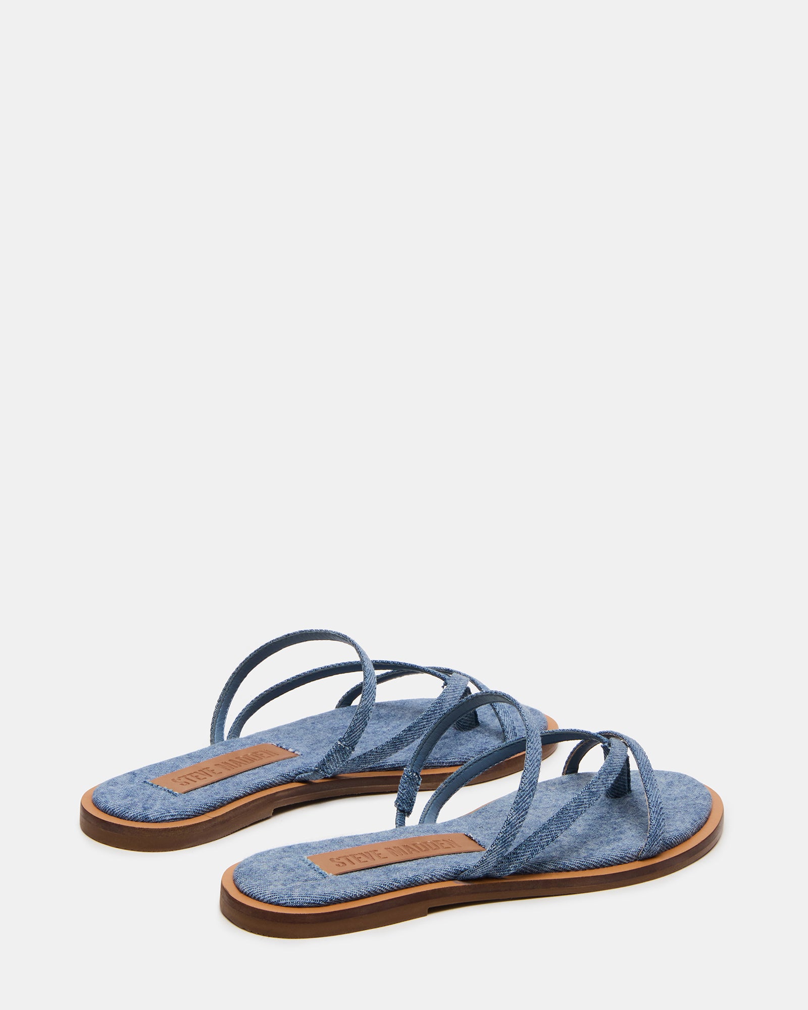 Side view of sandals worn with jeans for a casual daytime look