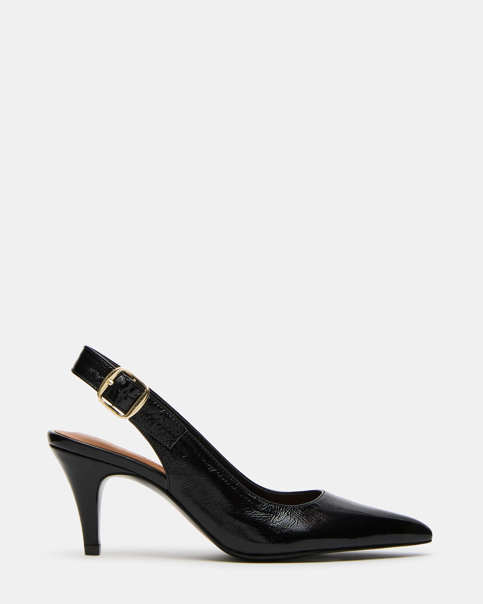 Close-up of black patent leather pumps showing pointed toe detail