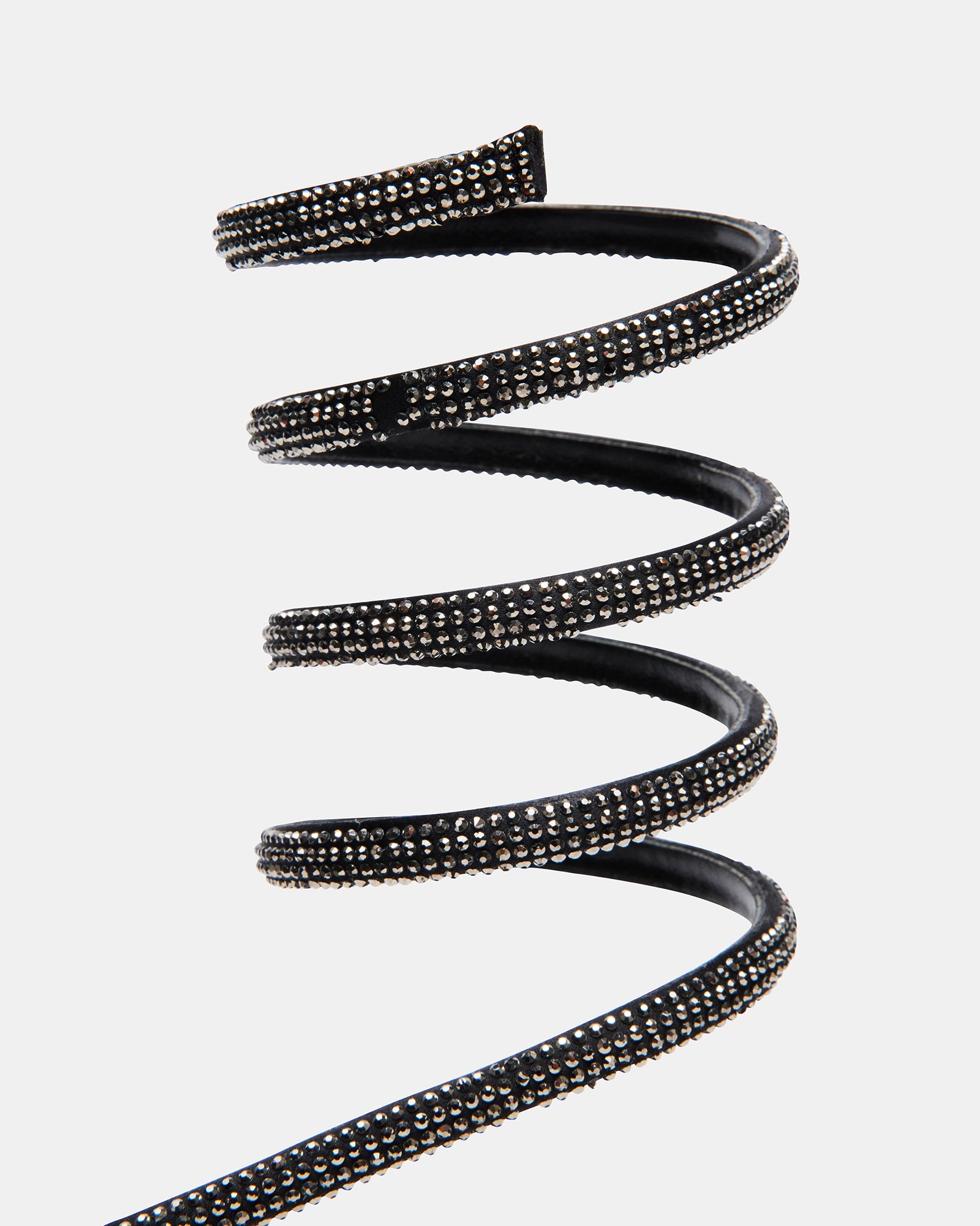 Side view of rhinestone heels showing coiled ankle strap sparkle