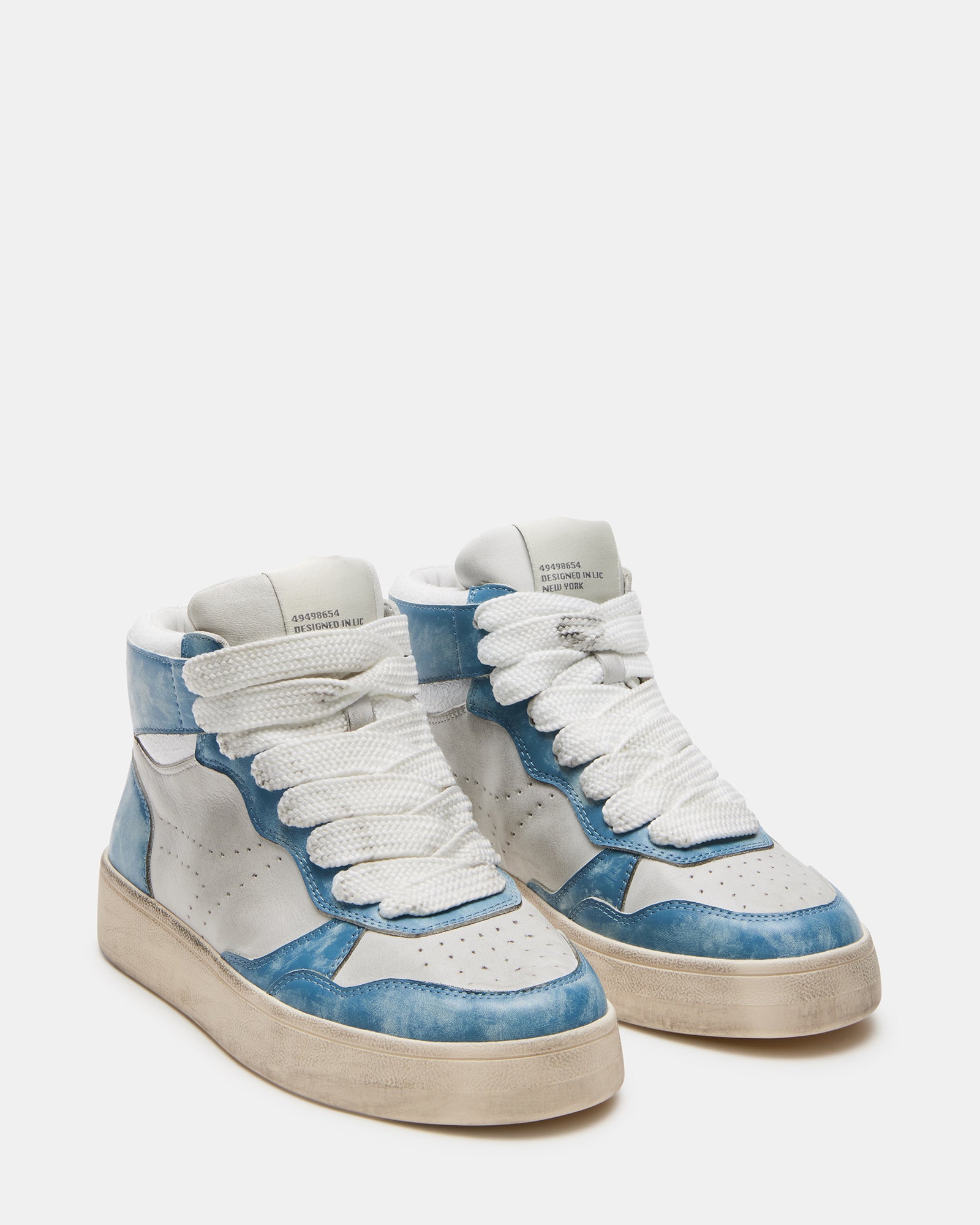 Close-up of perforated details and contrast panel on womens platform sneakers