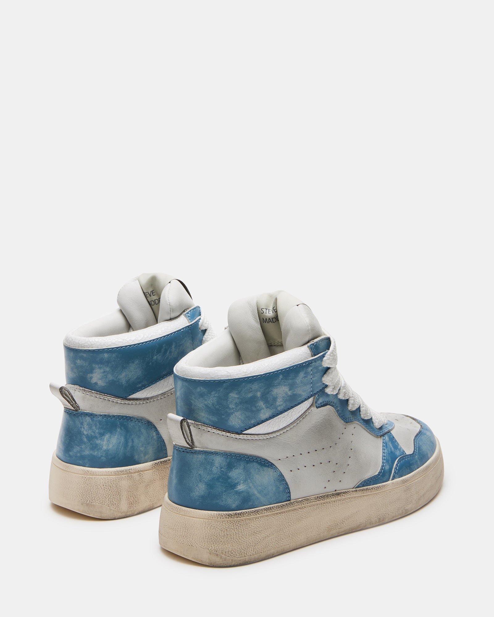 Close-up of perforated details and contrast panel on womens platform sneakers