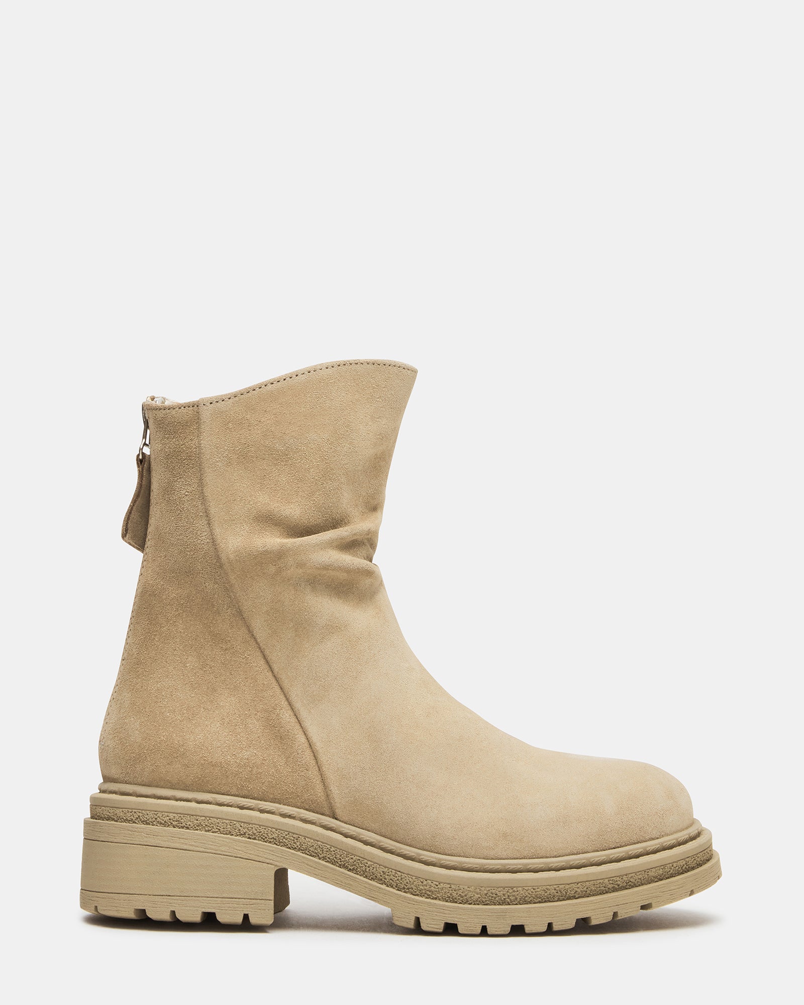 Side angle of taupe suede knee high boots showcasing scrunched design.