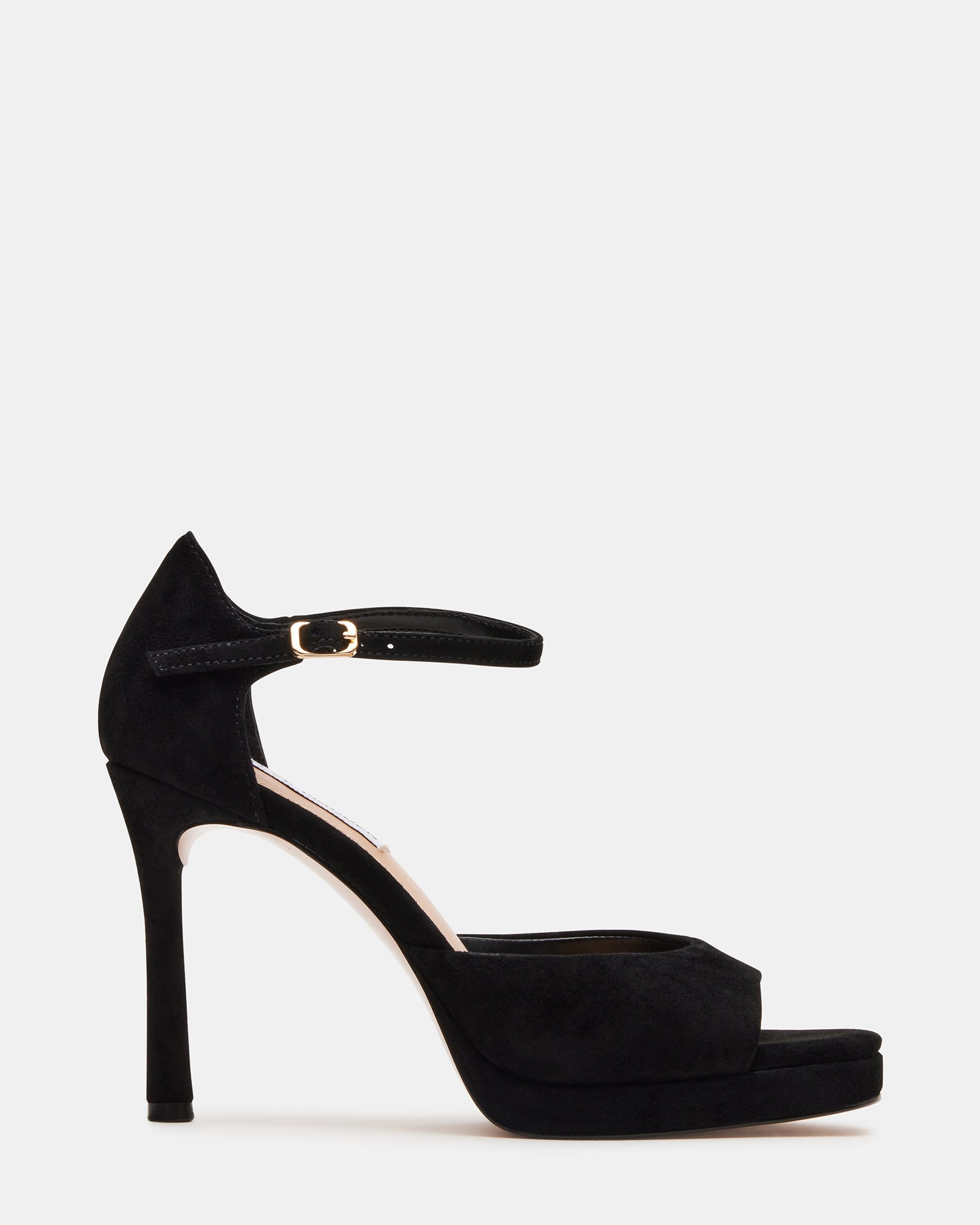 Close-up of black heels showcasing suede texture and ankle strap design