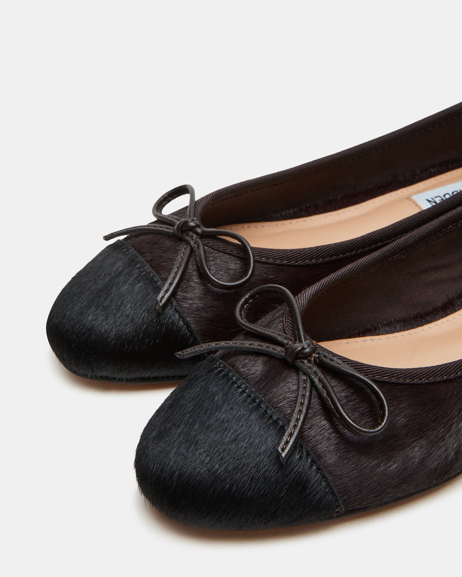 Woman wearing these comfortable shoes with a stylish outfit.