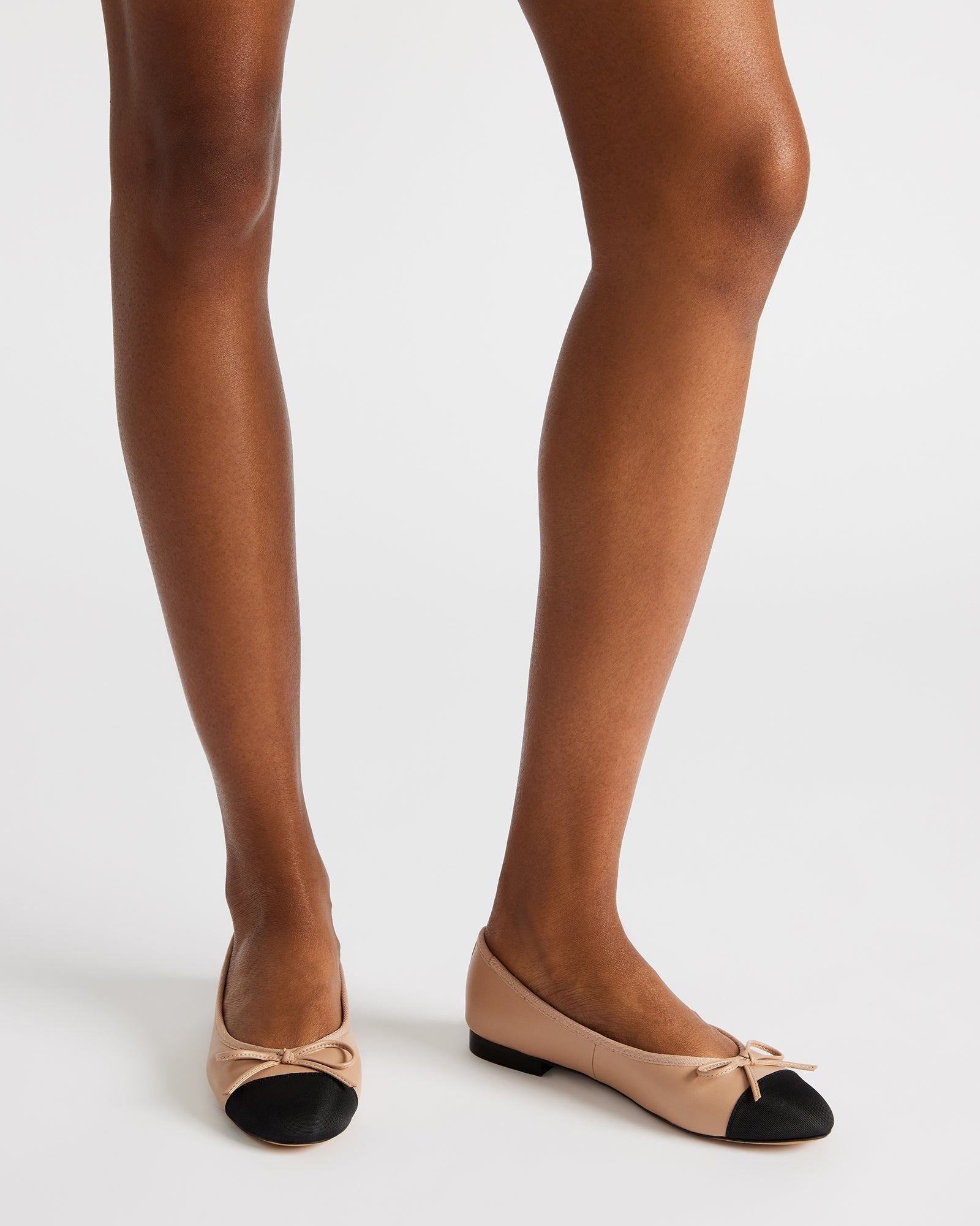 Woman wearing these comfortable shoes with a stylish outfit.