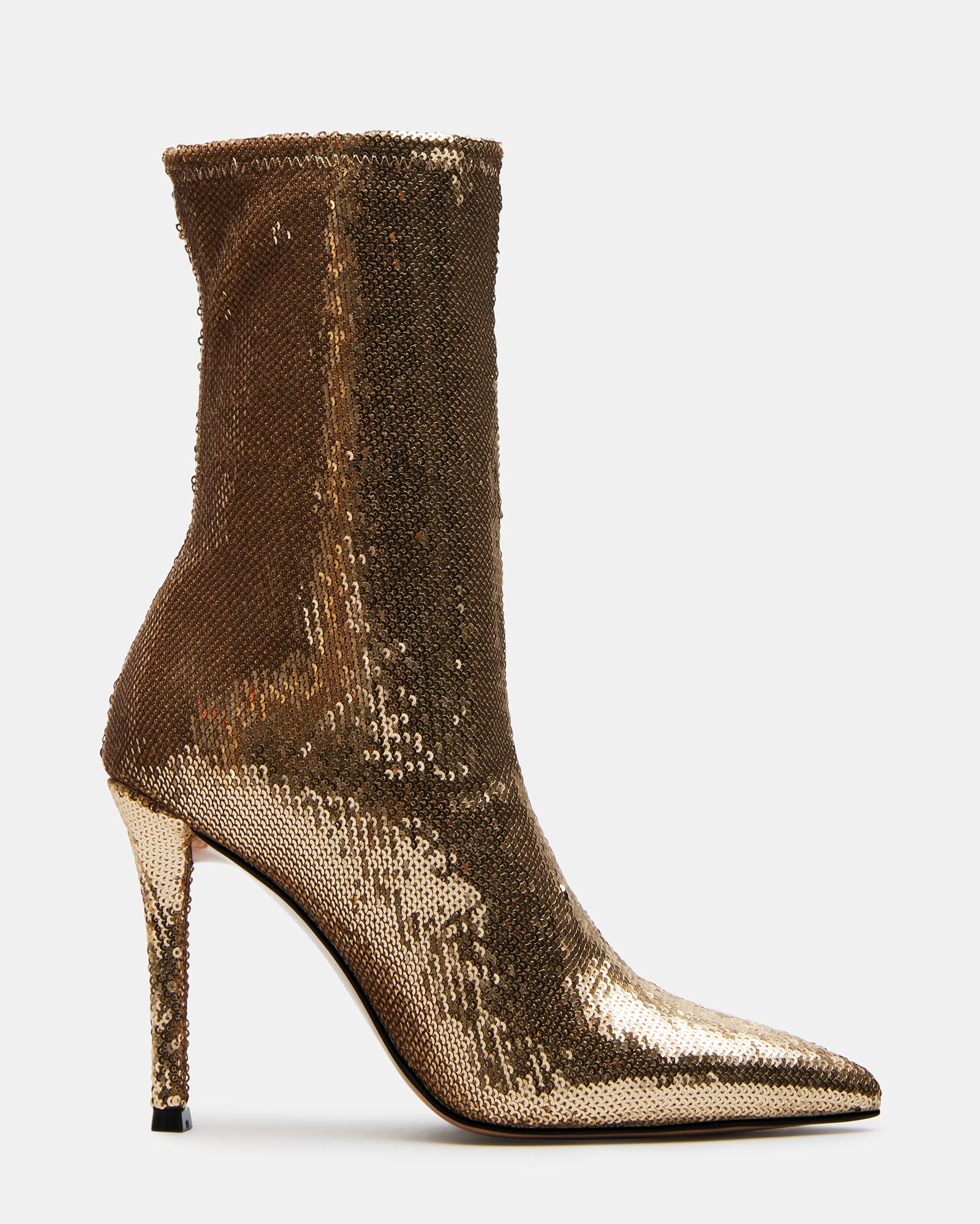 Gold sequin stiletto heel ankle boots paired with a little black dress