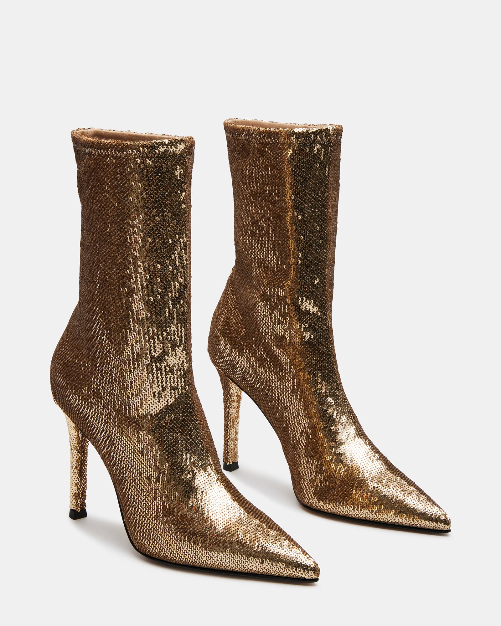 Close-up of Ethereal boots pointed toe and glittering sequin detail