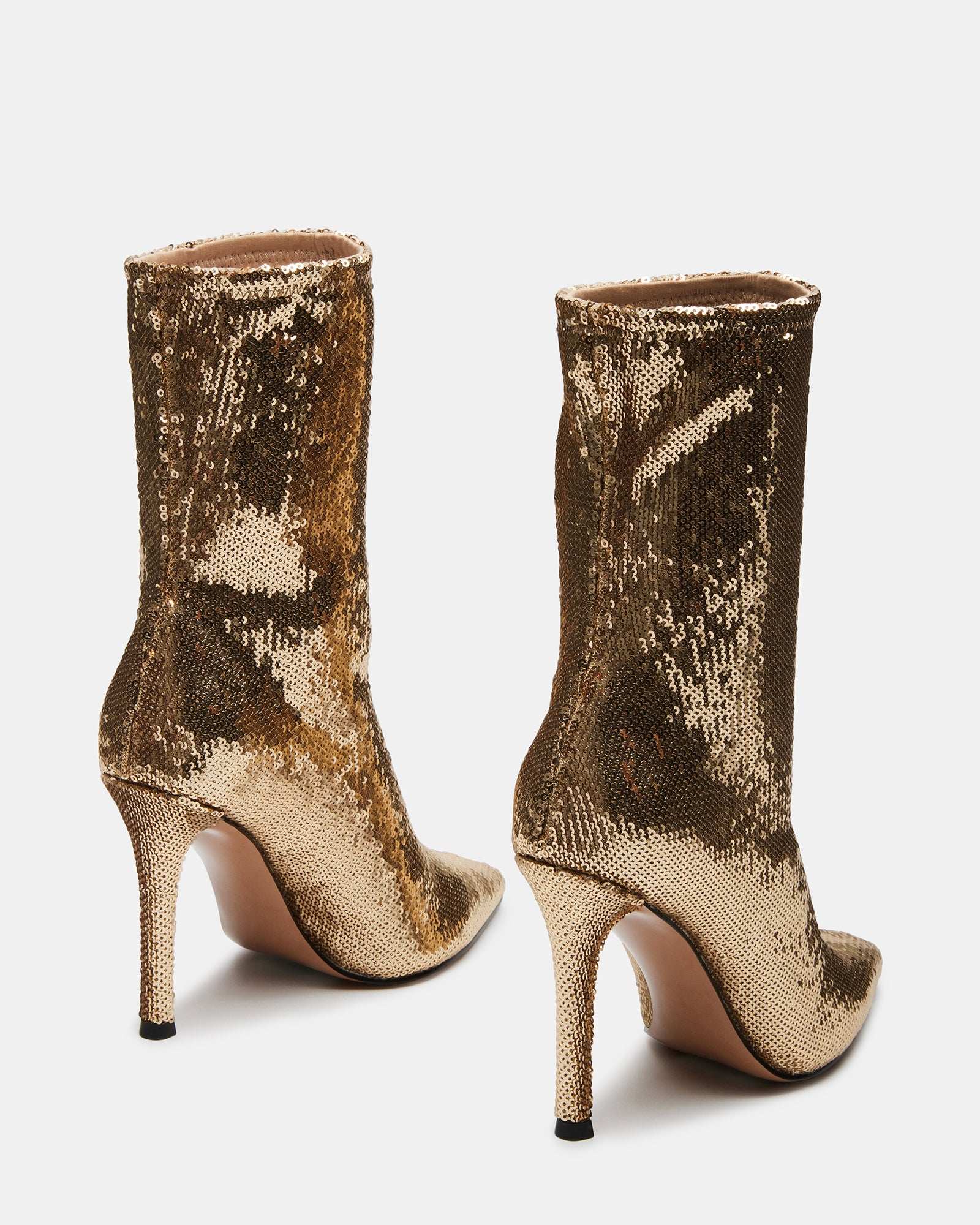 Close-up of Ethereal boots pointed toe and glittering sequin detail