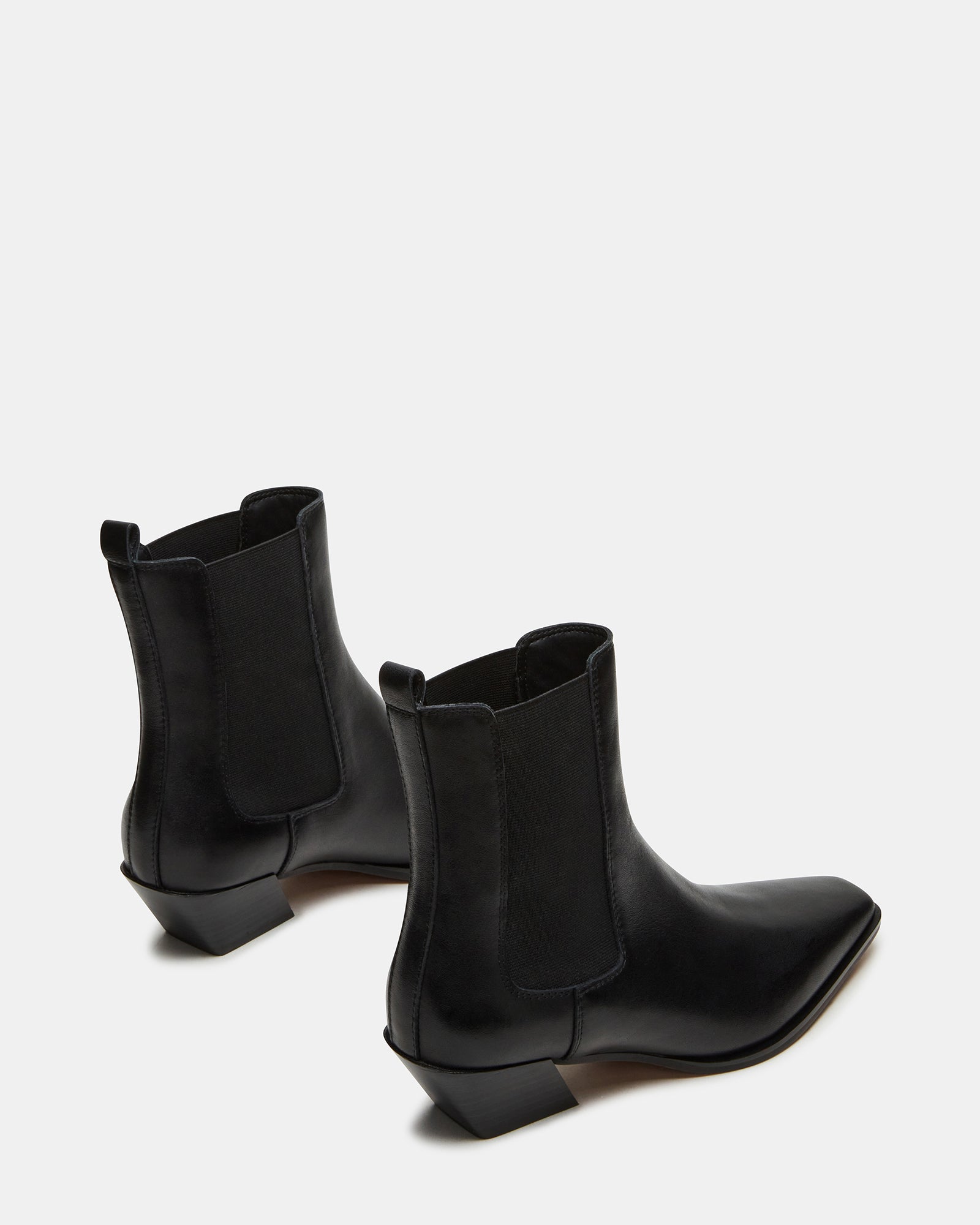 Close-up of the EVAN boots leather texture and square toe design.