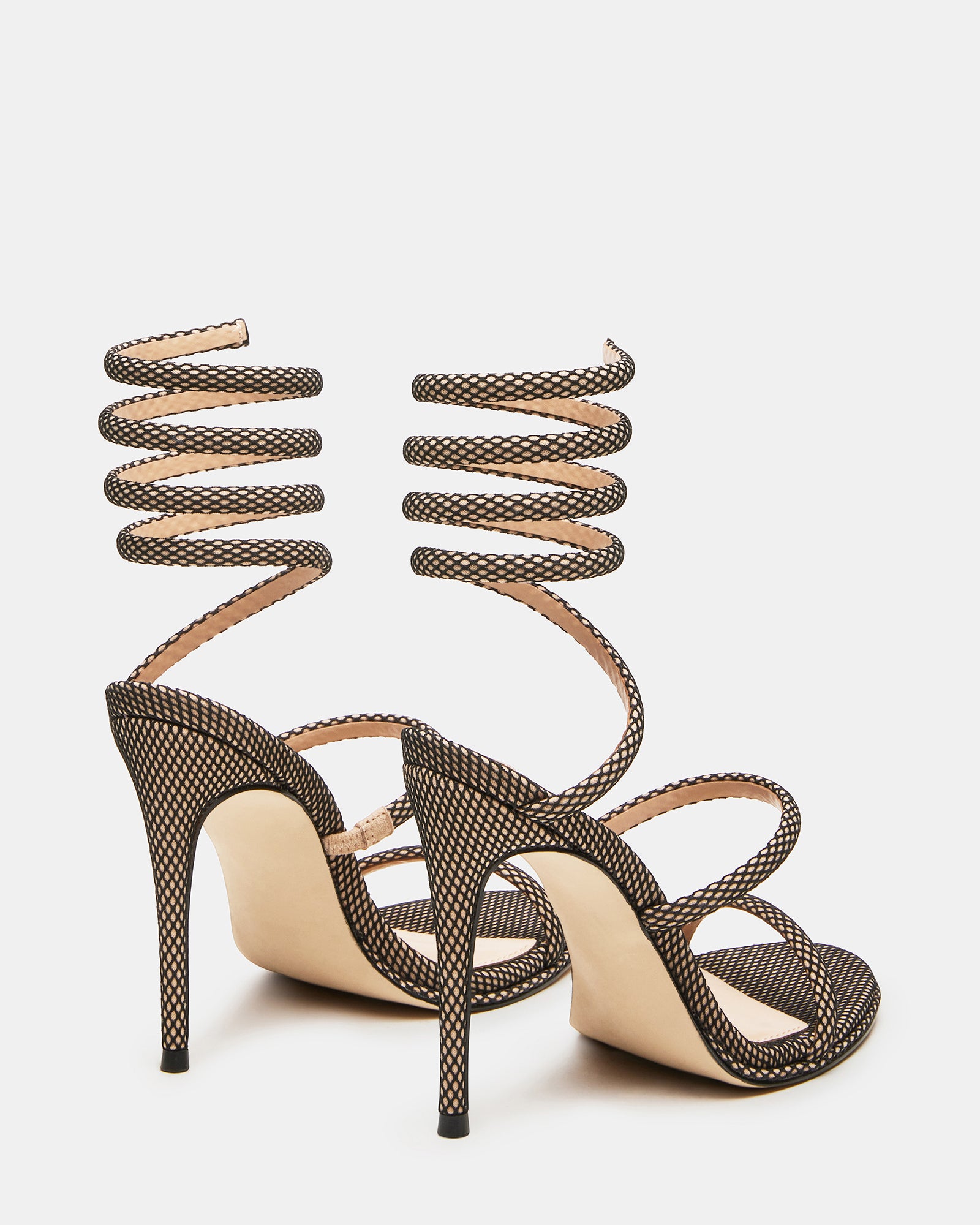 Front view of Exotica Luxe stiletto sandals on a models feet.