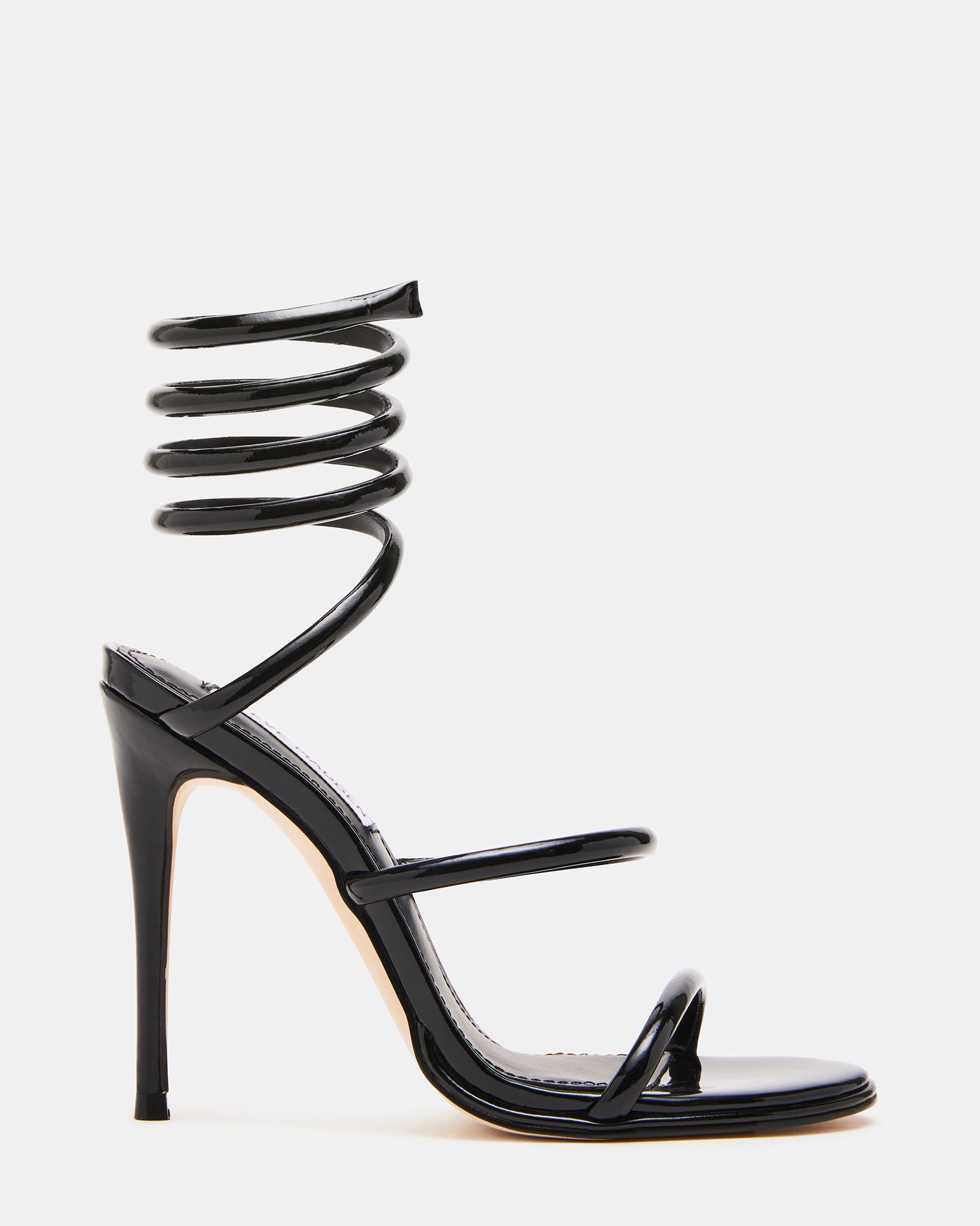 Elegant Exotica black patent leather pumps showcasing stiletto heels.