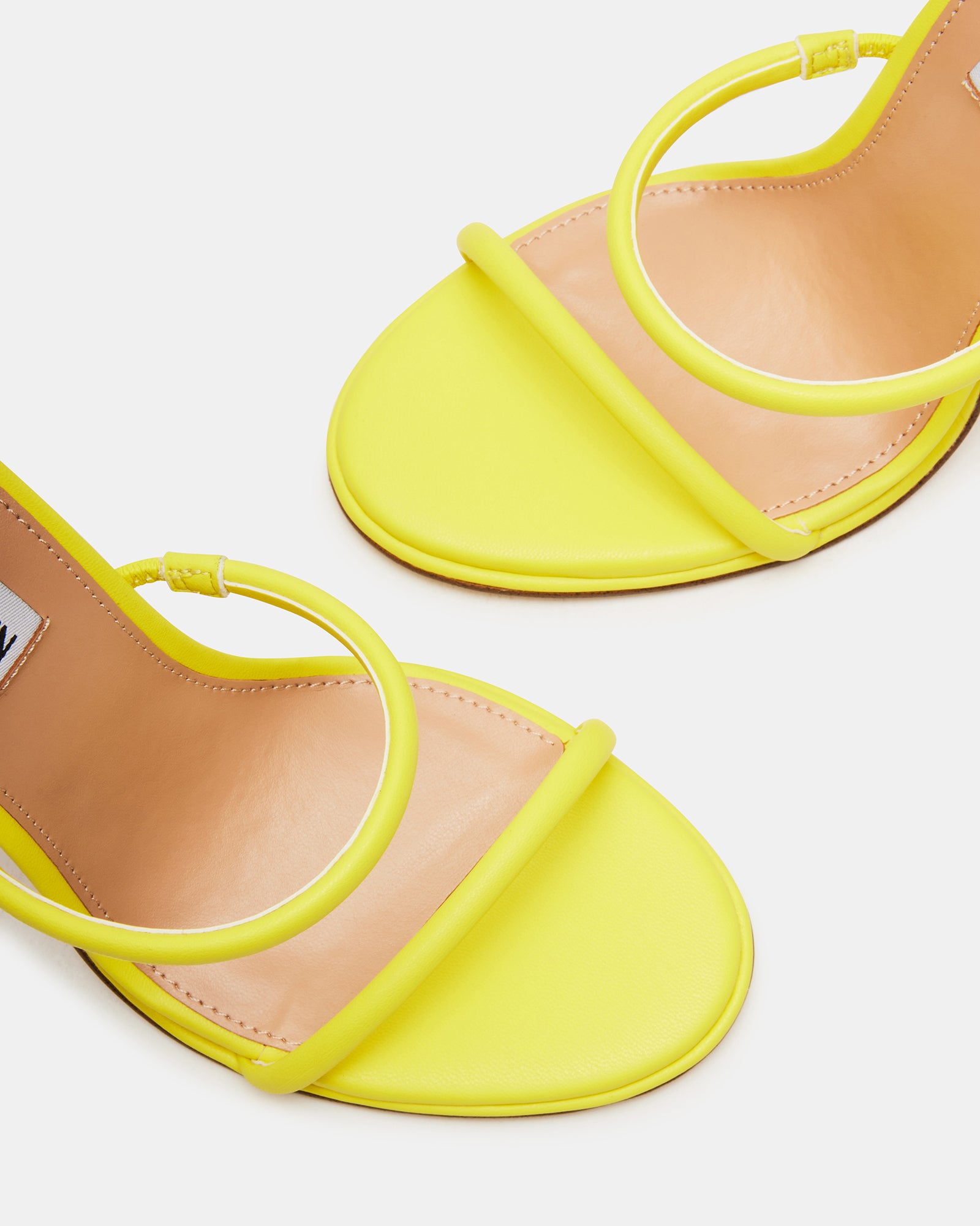 Front angle of yellow stiletto sandals for upscale evening wear