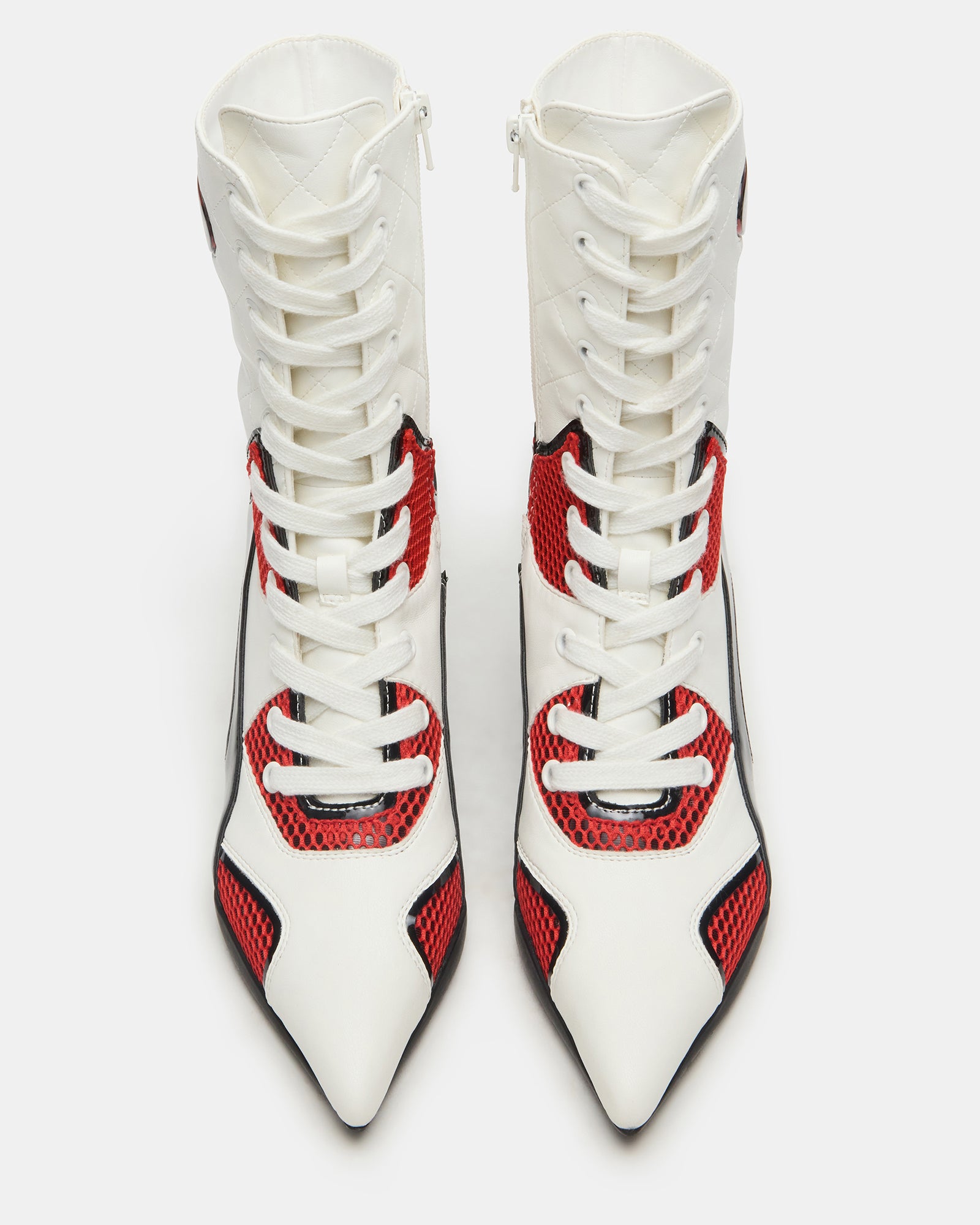 Fangio ankle booties with pointed toe and kitten heel, ideal for office wear.