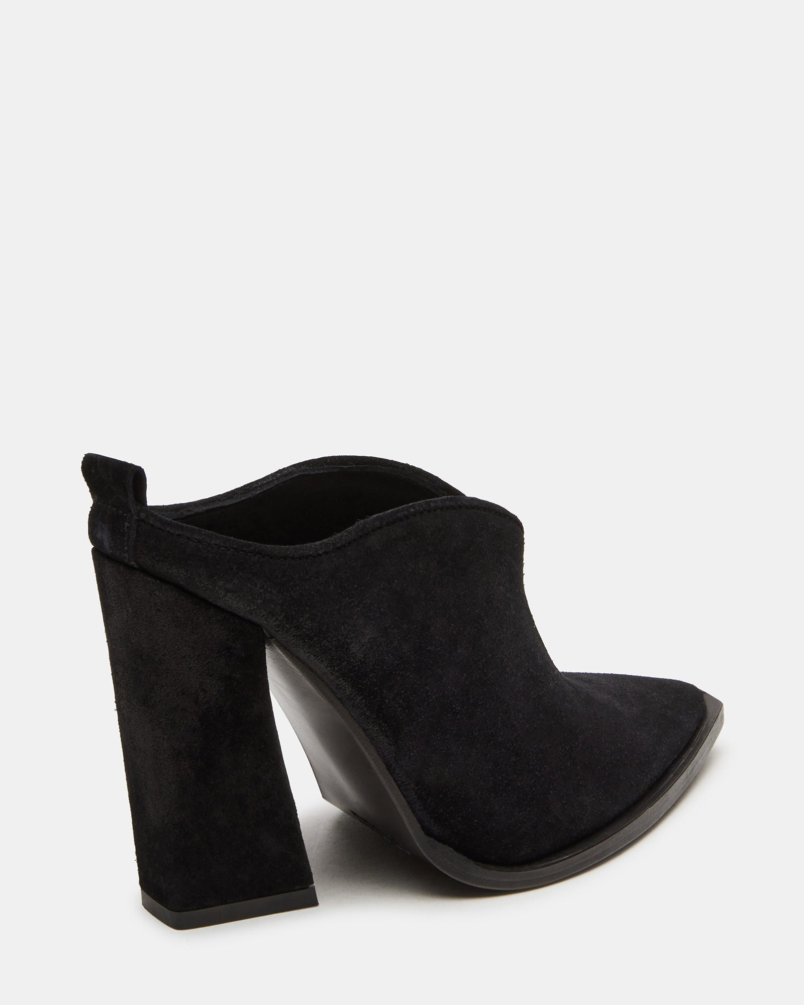 Close-up of suede texture and stitching detail on the brown suede heels from rear angle.
