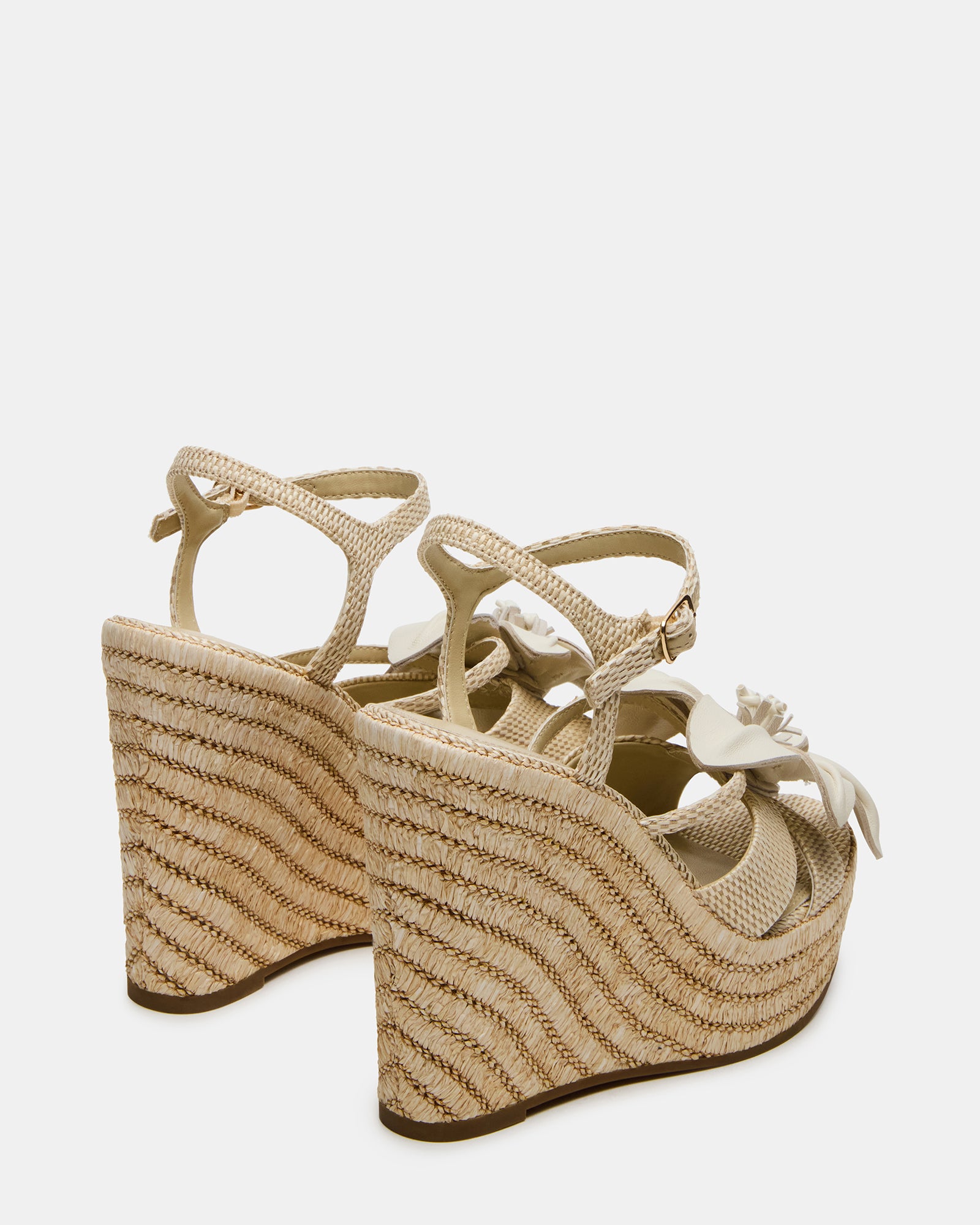 Side view of black platform wedge sandals with ankle strap, perfect for a summer day out.
