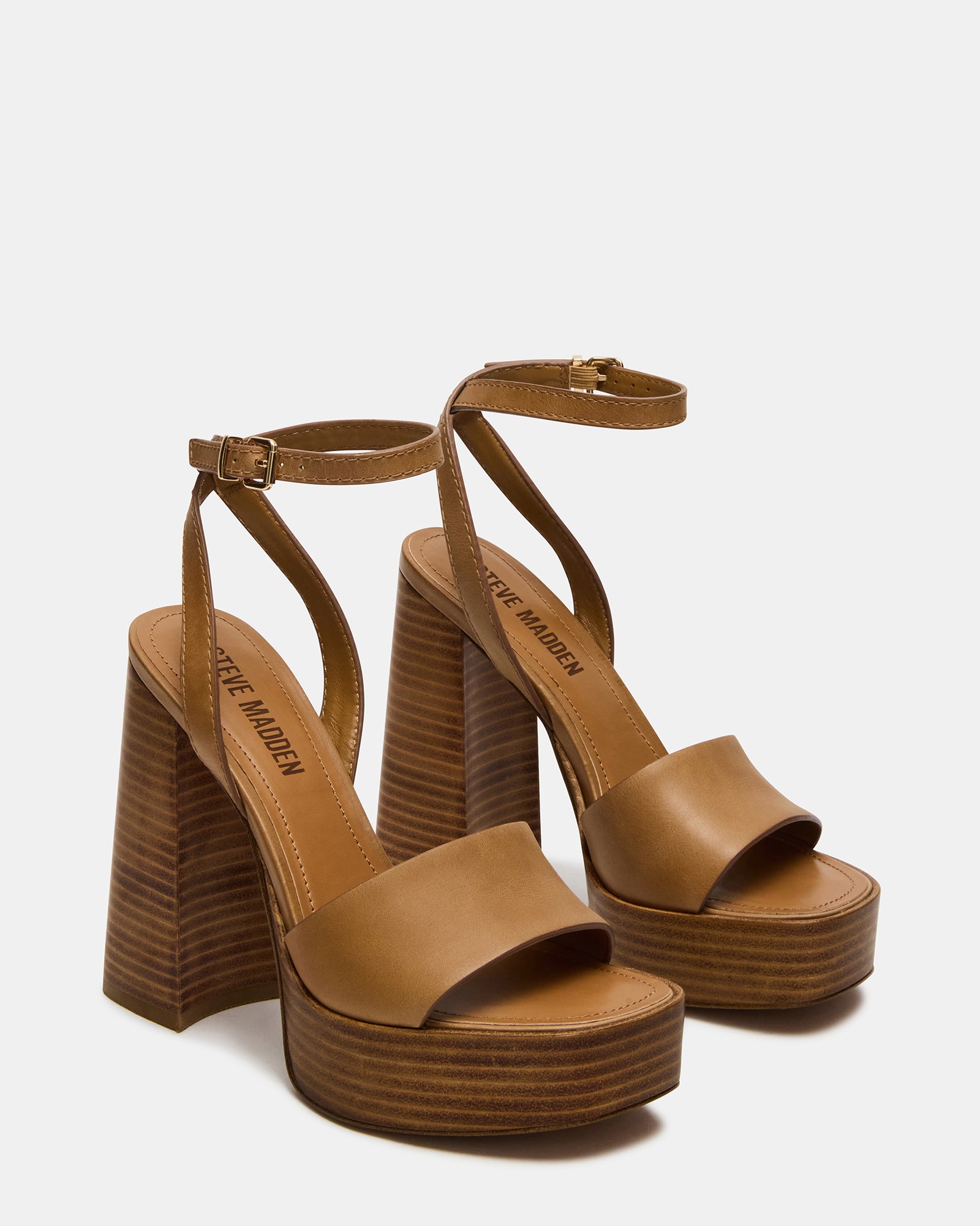 Close-up of the square toe and wood bottom of the Floria Luxe heels.