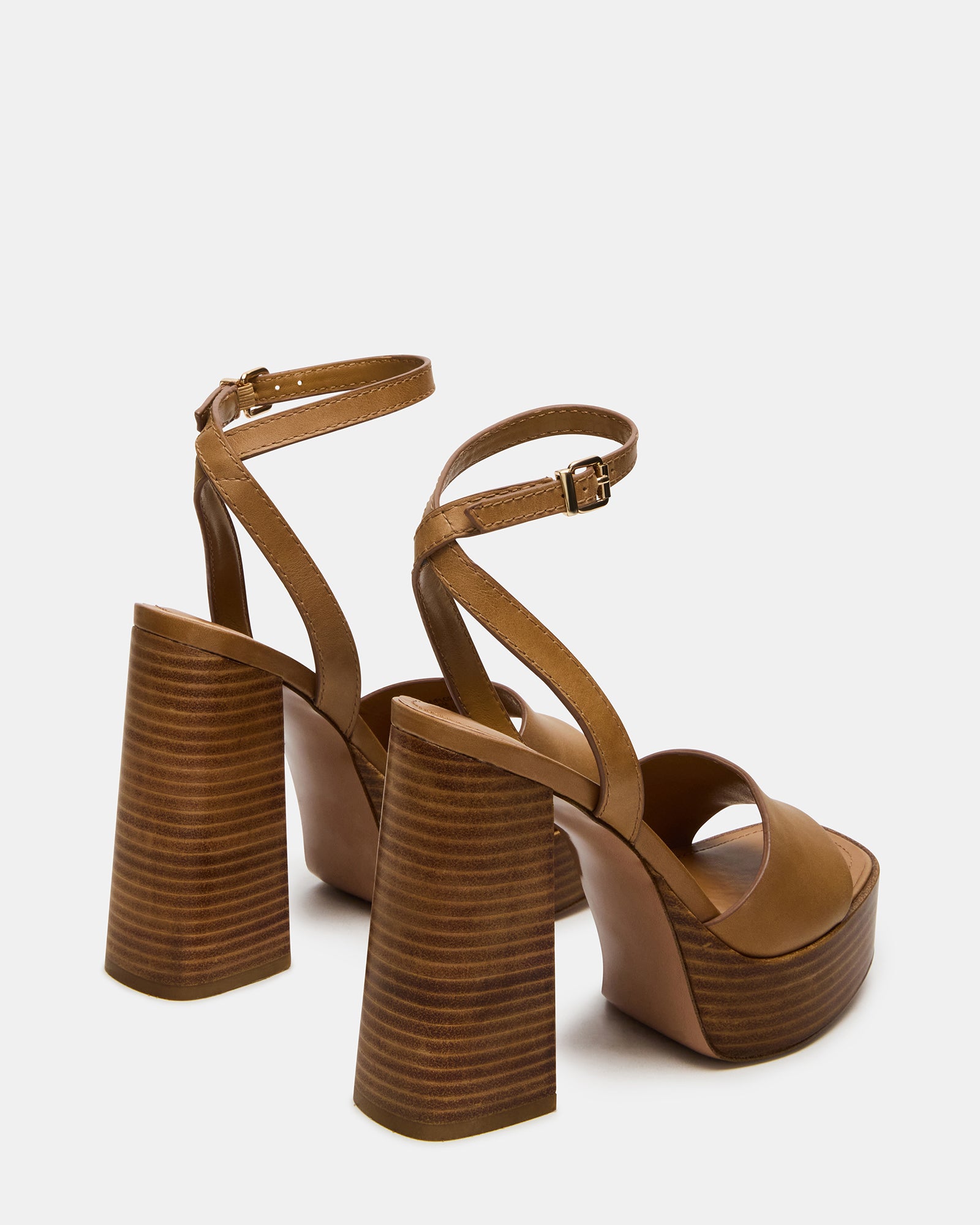 Close-up of the square toe and wood bottom of the Floria Luxe heels.