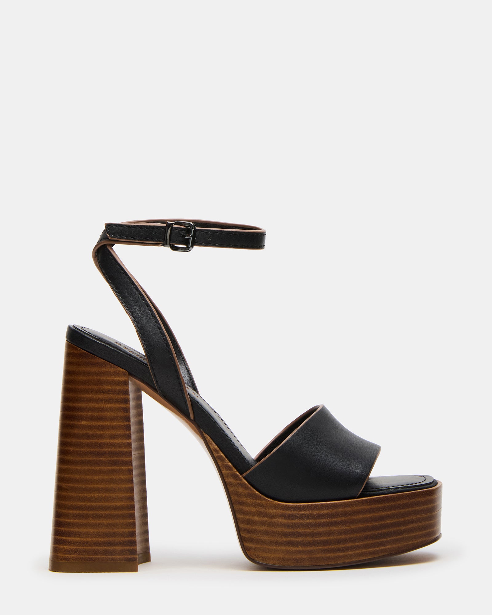 Floria black leather sandals side view on marble floor