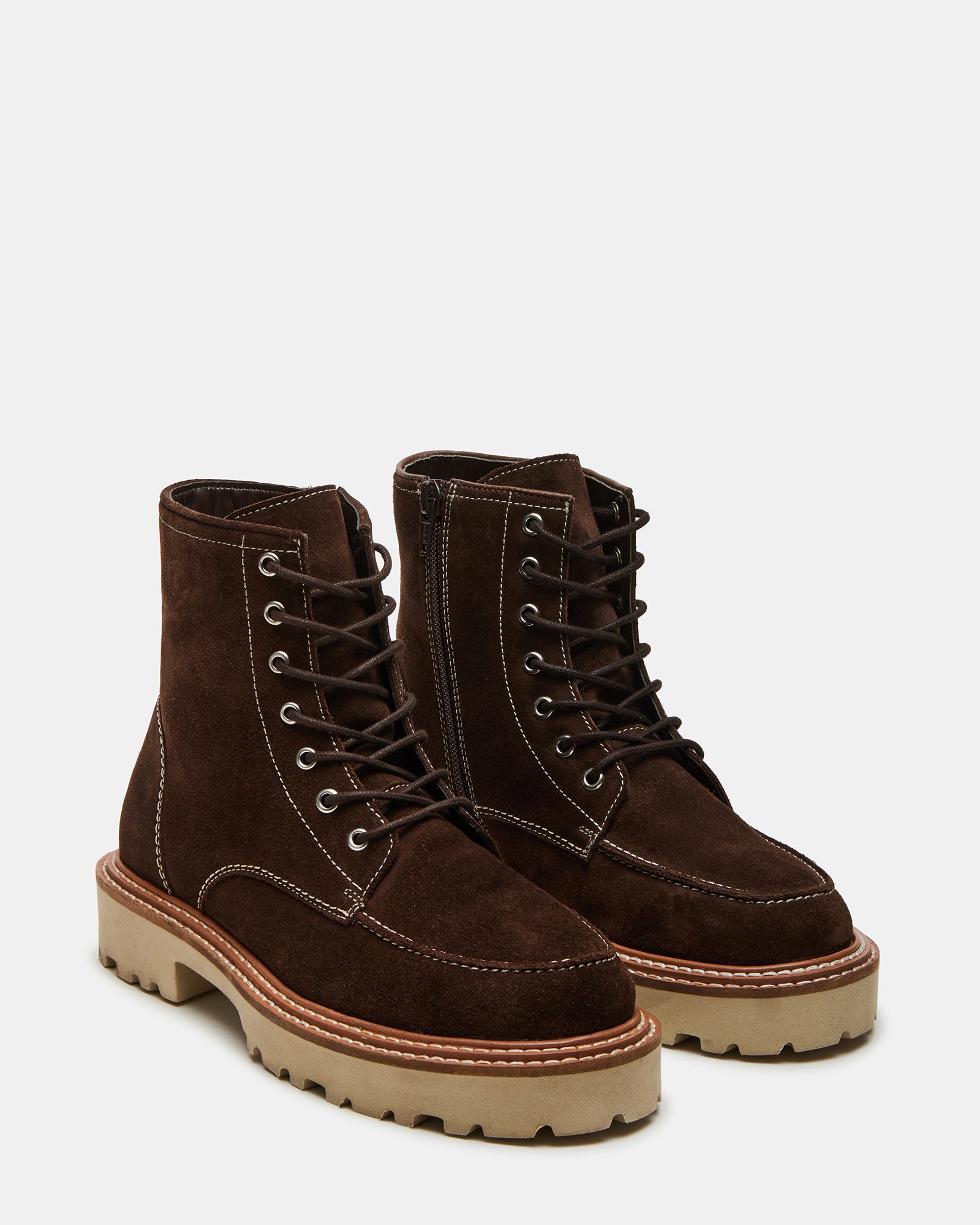 Side angle of womens boots highlighting suede texture and lug sole