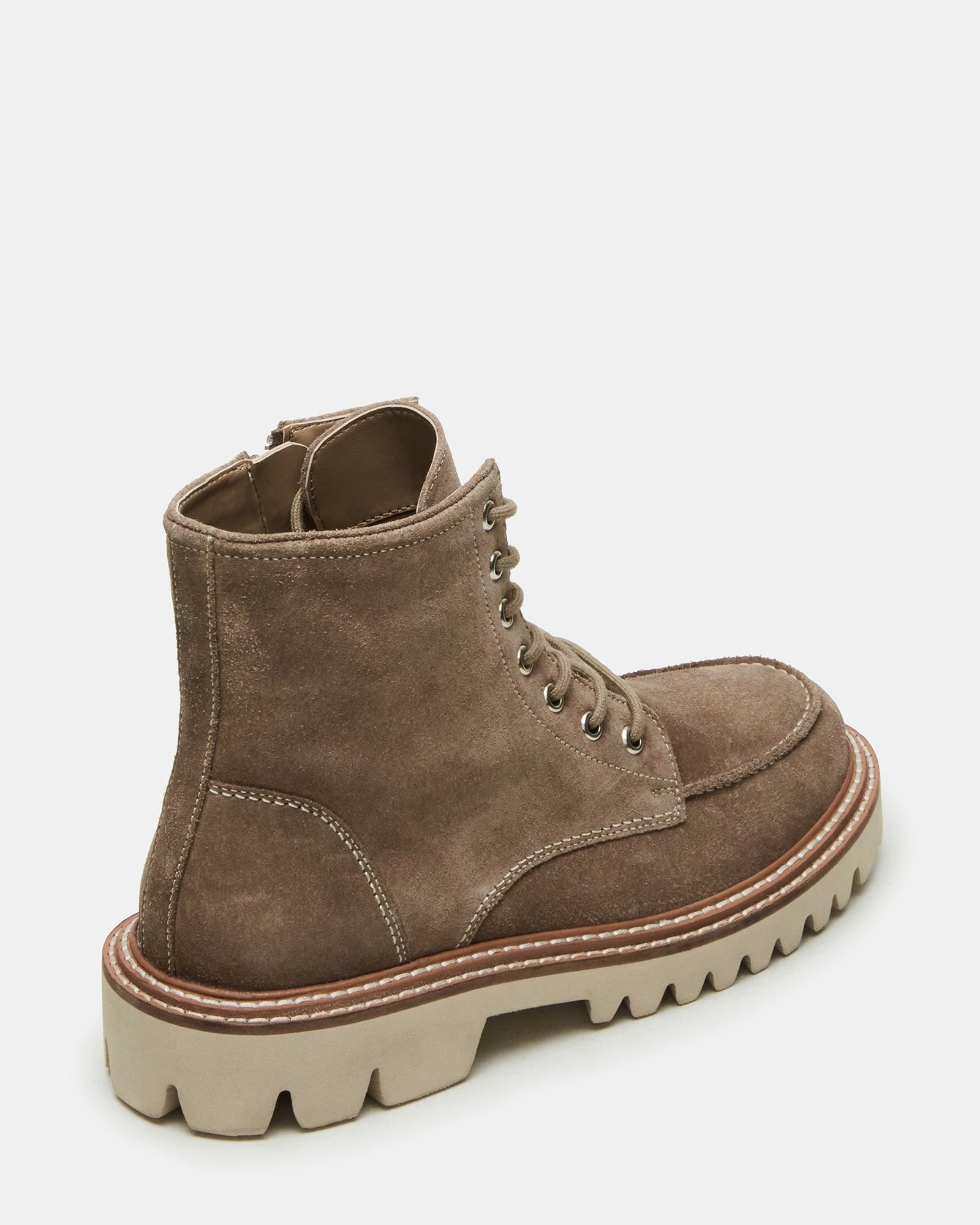 Front angle of womens ankle boots with detailed lace-up design